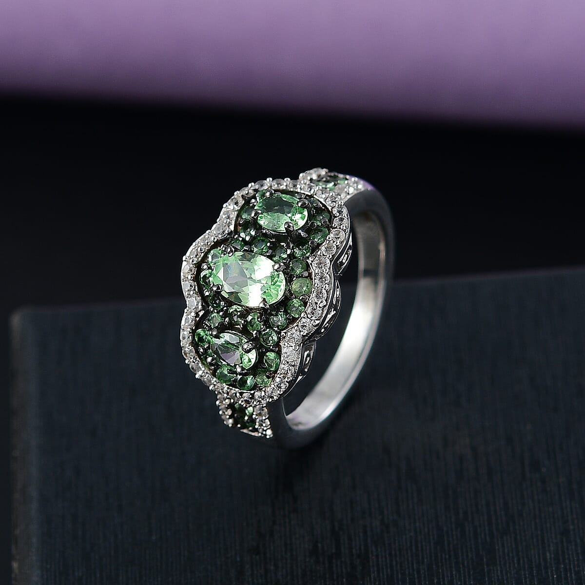 D'Joy Tsavorite Garnet and White Zircon 2.40 ctw Trilogy Ring in Rhodium Over Sterling Silver (Size 8.0) image number 1