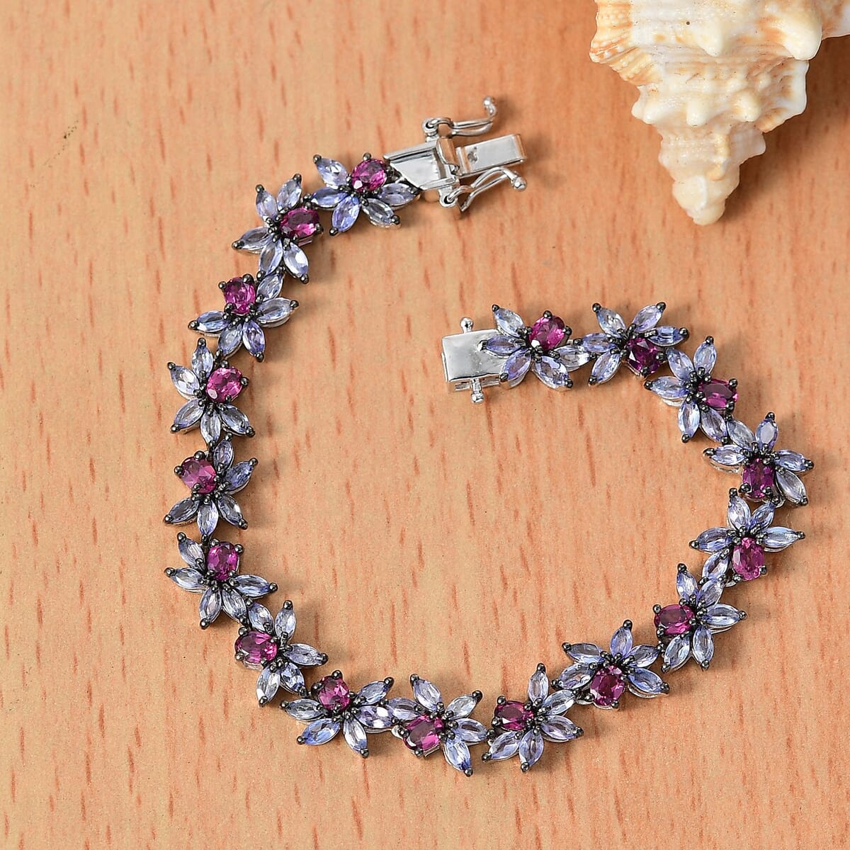 AAA Radiant Ember Garnet and Tanzanite 13.25 ctw Floral Link Bracelet in Rhodium Over Sterling Silver (8.00 In) image number 1
