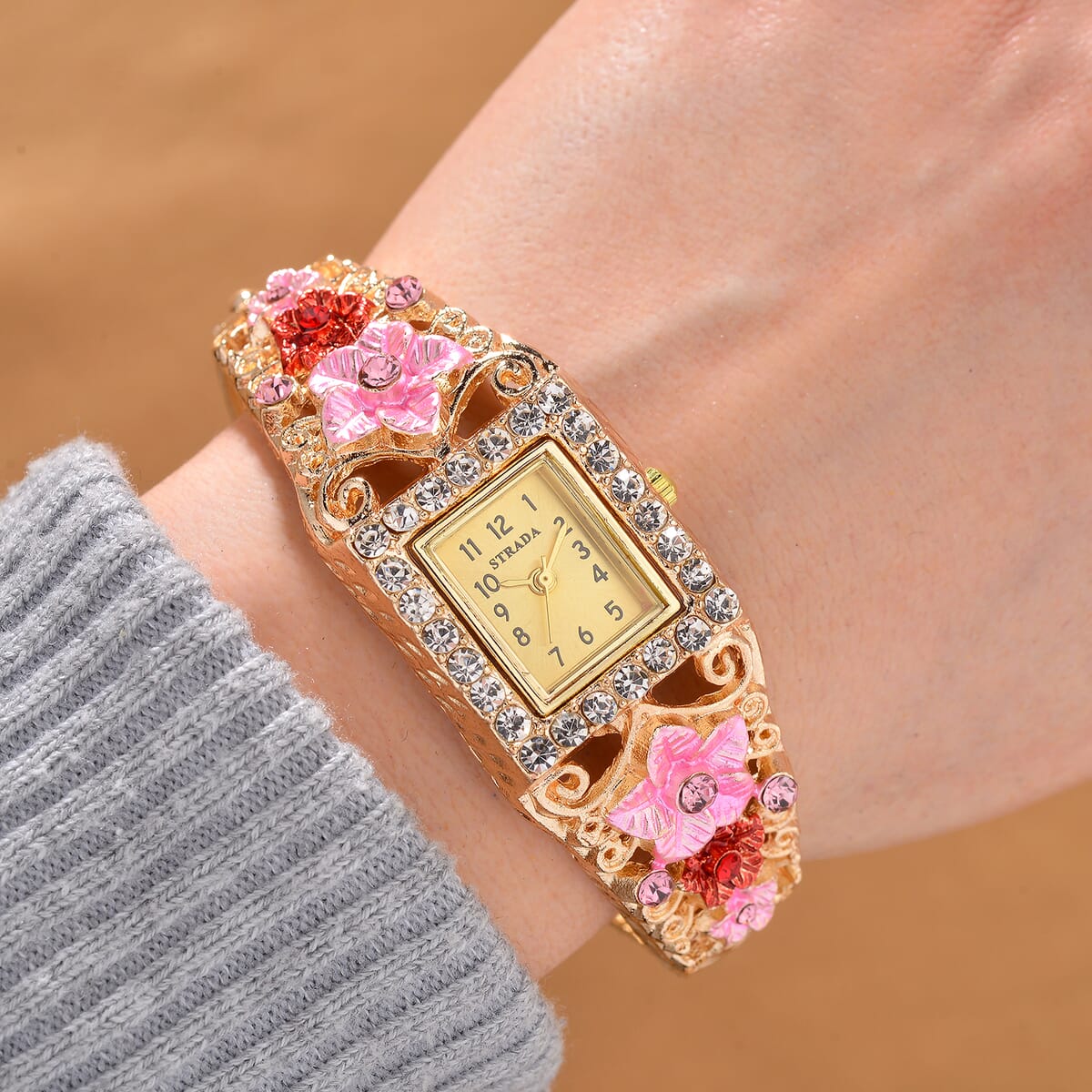 Strada Multi Color Crystal and Enameled Japanese Movement Pink Floral Bangle Bracelet Watch in Goldtone image number 1
