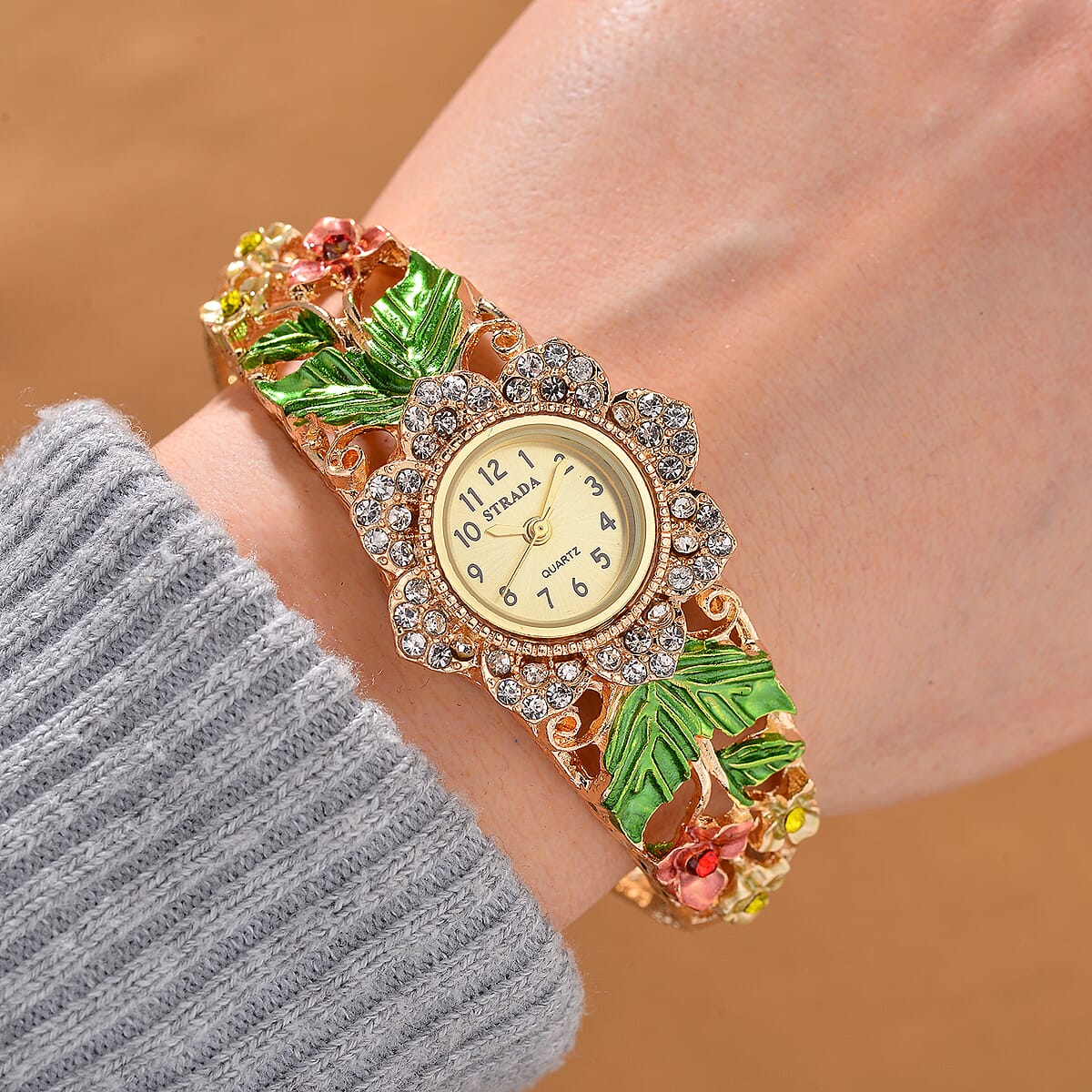 Strada Multi Color Crystal and Enameled Japanese Movement Green Floral Bangle Bracelet Watch in Goldtone image number 1