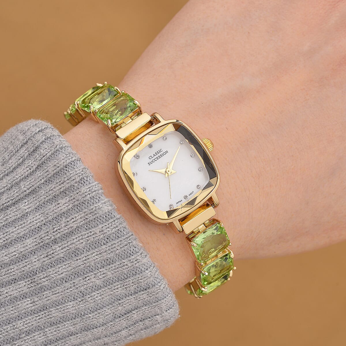 Classic Succession Austrian Crystal Miyota Japanese Movement Watch with Simulated Green Diamond Strap in Goldtone and Stainless Steel Buckle 12.00 ctw image number 1