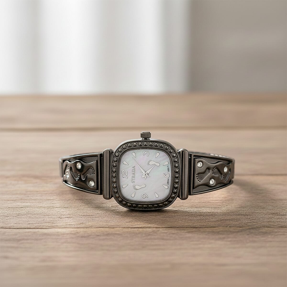 Foot Print in the Sand Strada Japanese Movement Simulated MOP Dial Watch in Black Silvertone and Stainless Steel image number 1