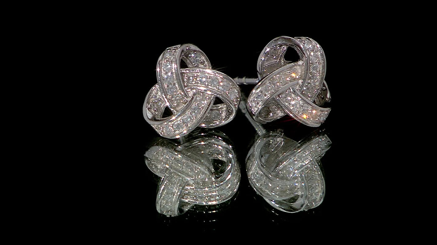 Luxuriant Lab Grown Diamond G-H SI 0.20 ctw Knot Earrings in Rhodium Over Sterling Silver
