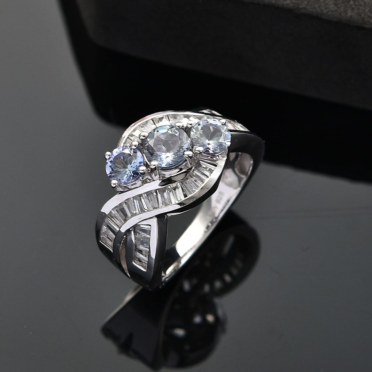Peacock Tanzanite and White Zircon 2.70 ctw Fluid Wave Ring in Rhodium Over Sterling Silver (Size 9.0) image number 1