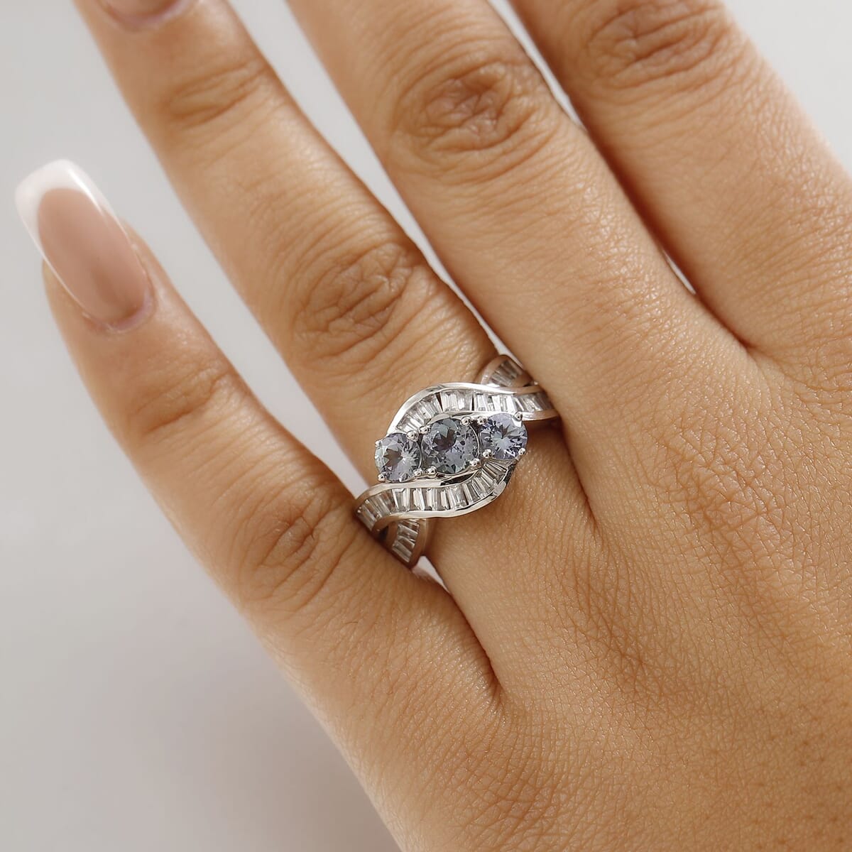 Peacock Tanzanite and White Zircon 2.70 ctw Fluid Wave Ring in Rhodium Over Sterling Silver (Size 9.0) image number 2