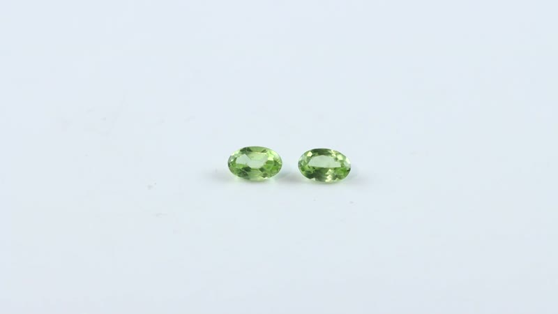 Hebei Peridot Set of 2 (Oval 5x3 mm) 0.46 ctw