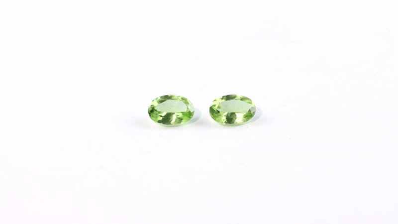 Hebei Peridot Set of 2 (Oval 6x4 mm) 0.93 ctw