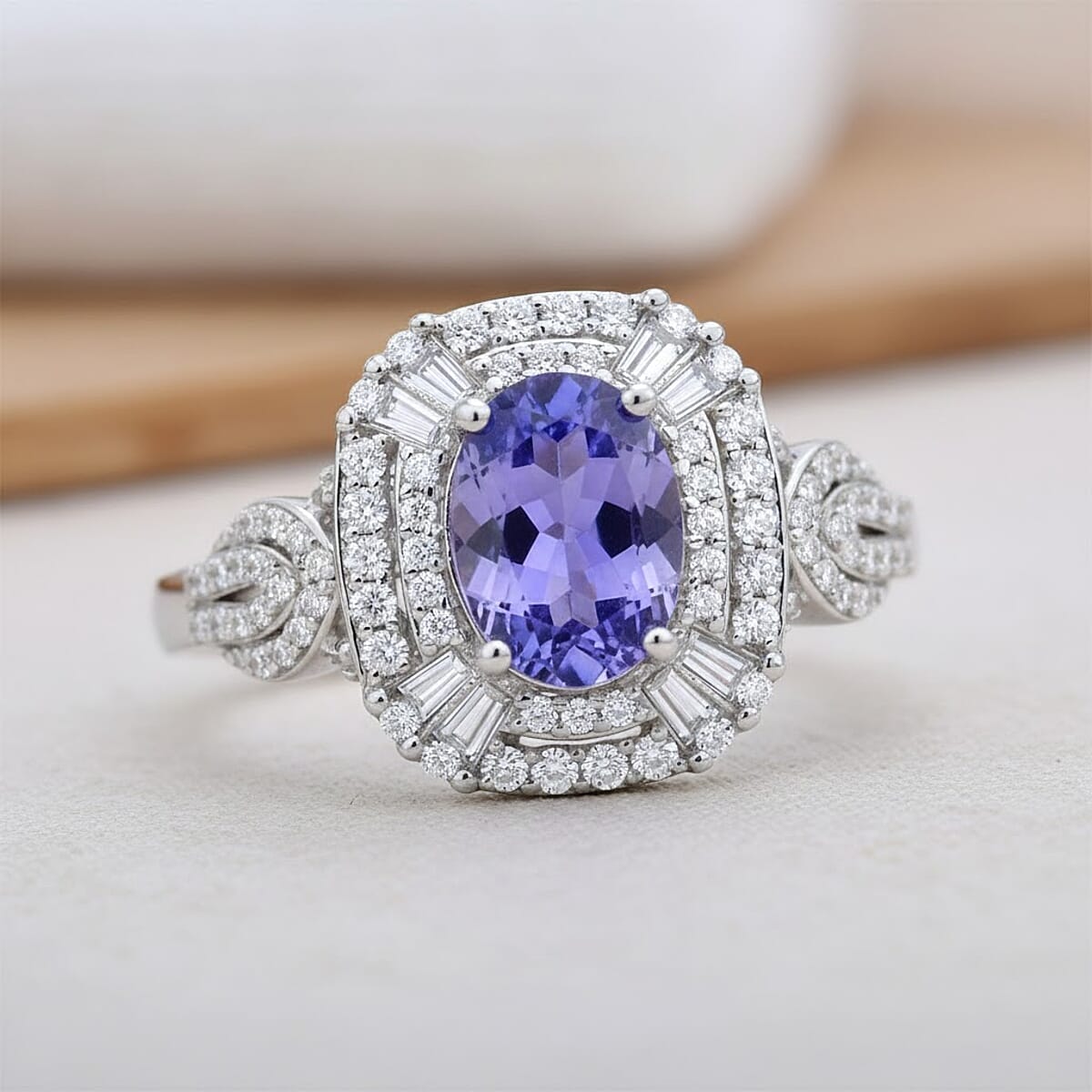 D'Joy Tanzanite and White Zircon 2.25 ctw Halo Ring in Rhodium Over Sterling Silver (Size 7.0) image number 1