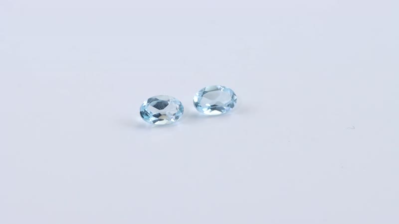 Swiss Blue Topaz Set of 2 (Oval 6x4 mm) 1.16 ctw
