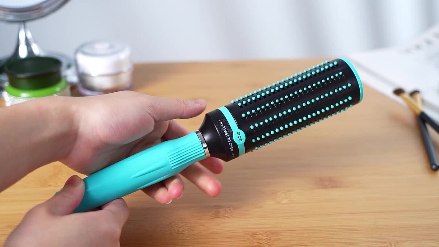Purple and Black Rotating Easy Clean Comb