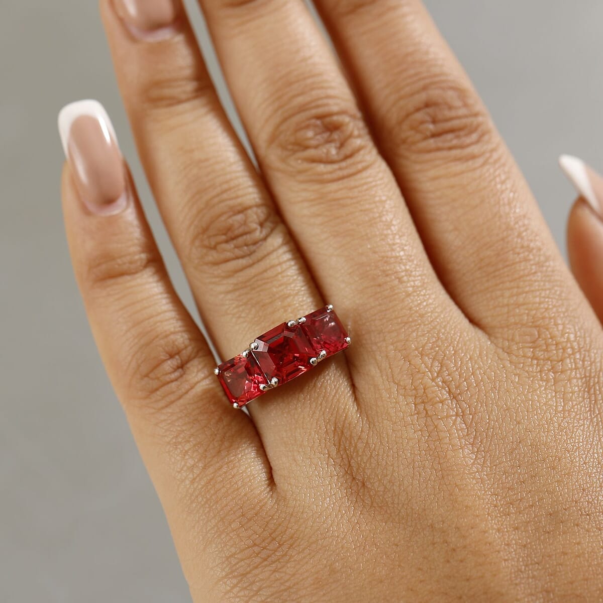 Certified & Appraised Luxuriant AAA Asscher Cut Lab Grown Padparadscha Sapphire 8.00 ctw 3 Stone Ring in 10K White Gold (Size 10.0) image number 2