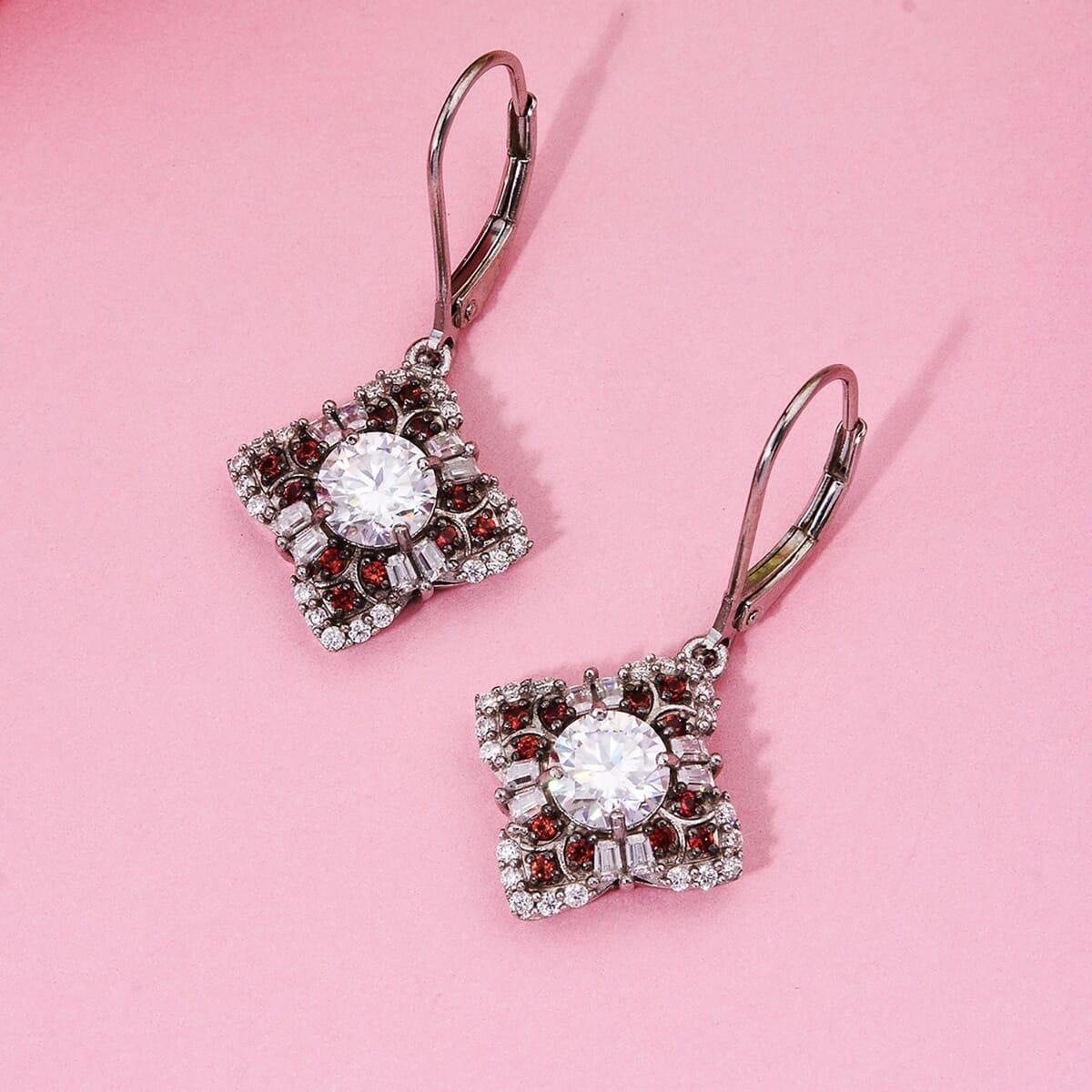 120 Faceted Moissanite and Madagascar Red Sapphire 2.70 ctw Leaf Clover Earrings in Rhodium Over Sterling Silver image number 1