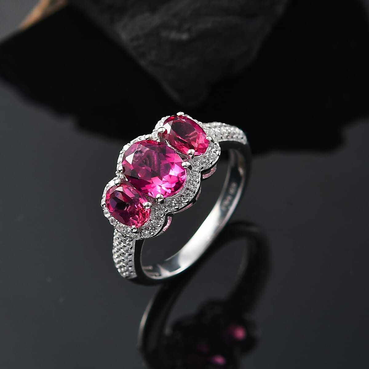 Luxuriant Premium Bixbite (LG) and White Zircon 2.65 ctw Trilogy Ring in Rhodium Over Sterling Silver (Size 10.0) image number 1