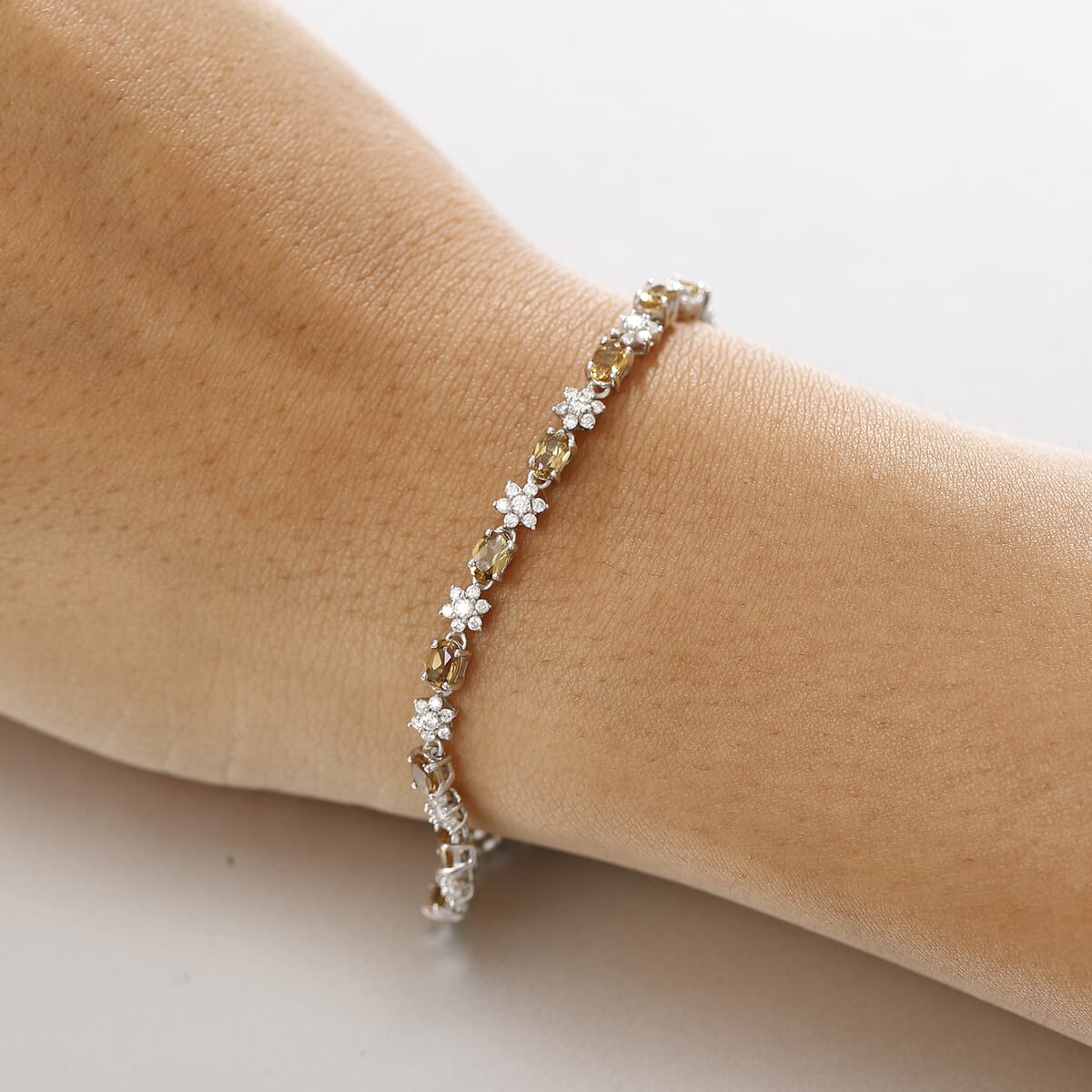 D'Joy Premium Golden Turkizite and Moissanite 4.80 ctw Floral Bracelet in Rhodium Over Sterling Silver (6.50 In) image number 2