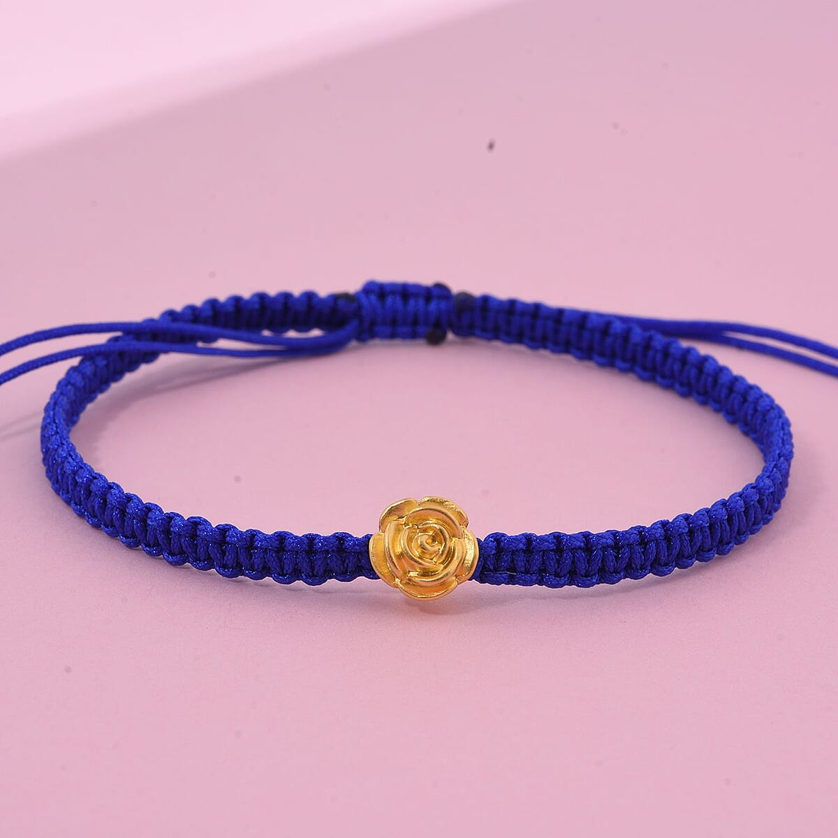 24K Yellow Gold Rose Floral Bracelet in Blue Cord Adjustable image number 1
