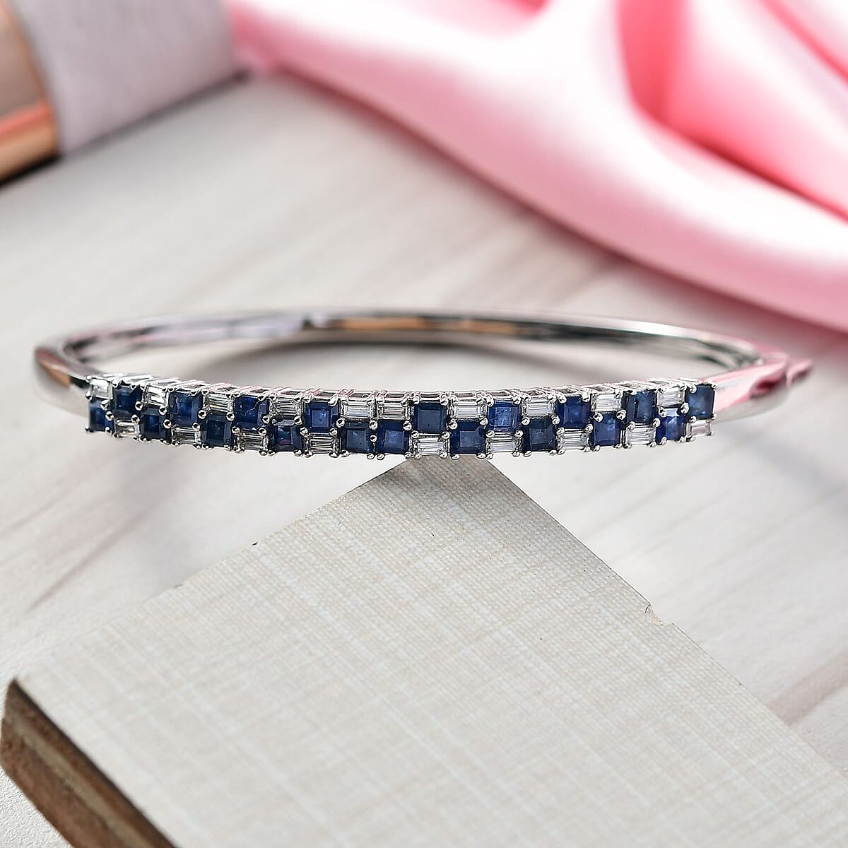 D'Joy Blue Sapphire and Moissanite 4.65 ctw Midnight Lineage Bangle Bracelet in Rhodium Over Sterling Silver (7.25 In) image number 1