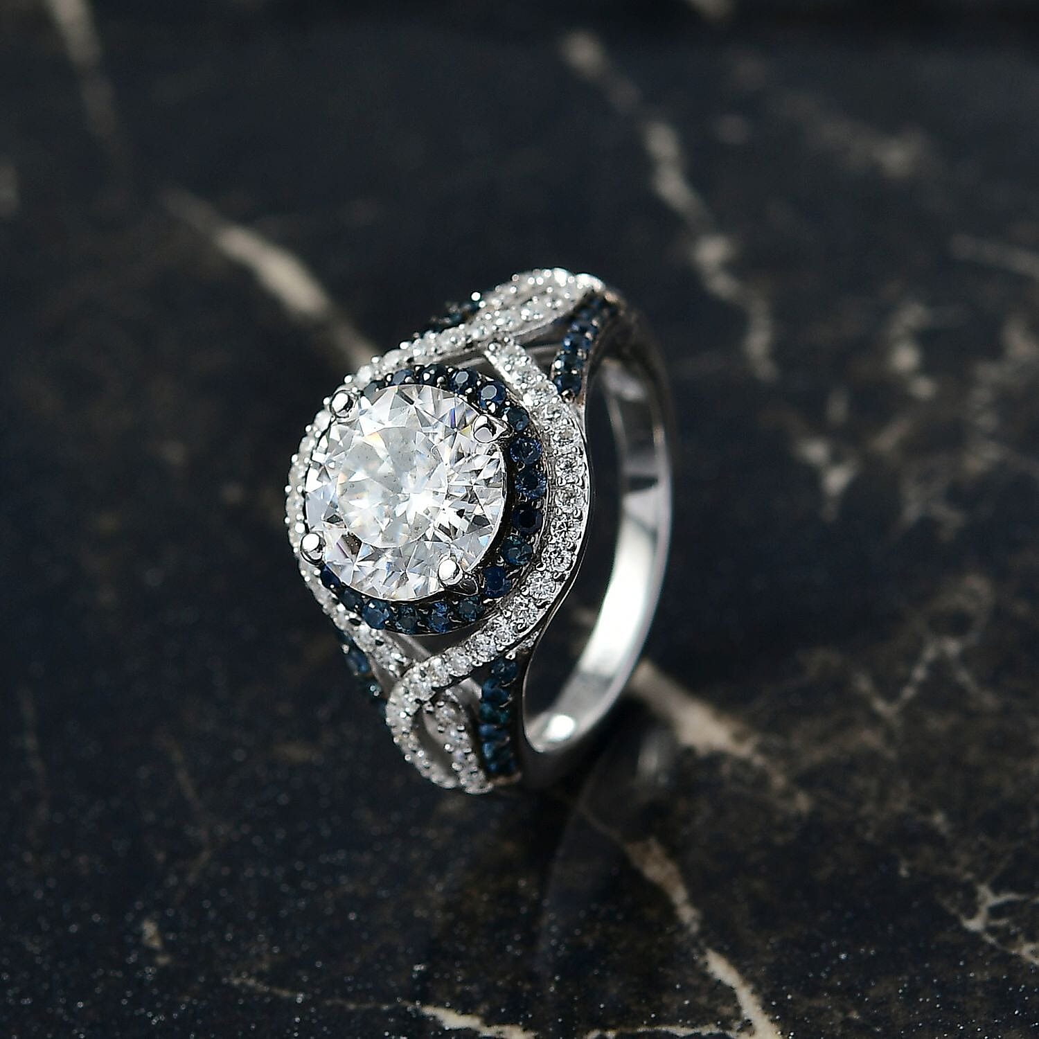 D'Joy 100 Facets Moissanite and Blue Sapphire 3.65 ctw Celestial Halo Ring in Rhodium Over Sterling Silver (Size 7.0)