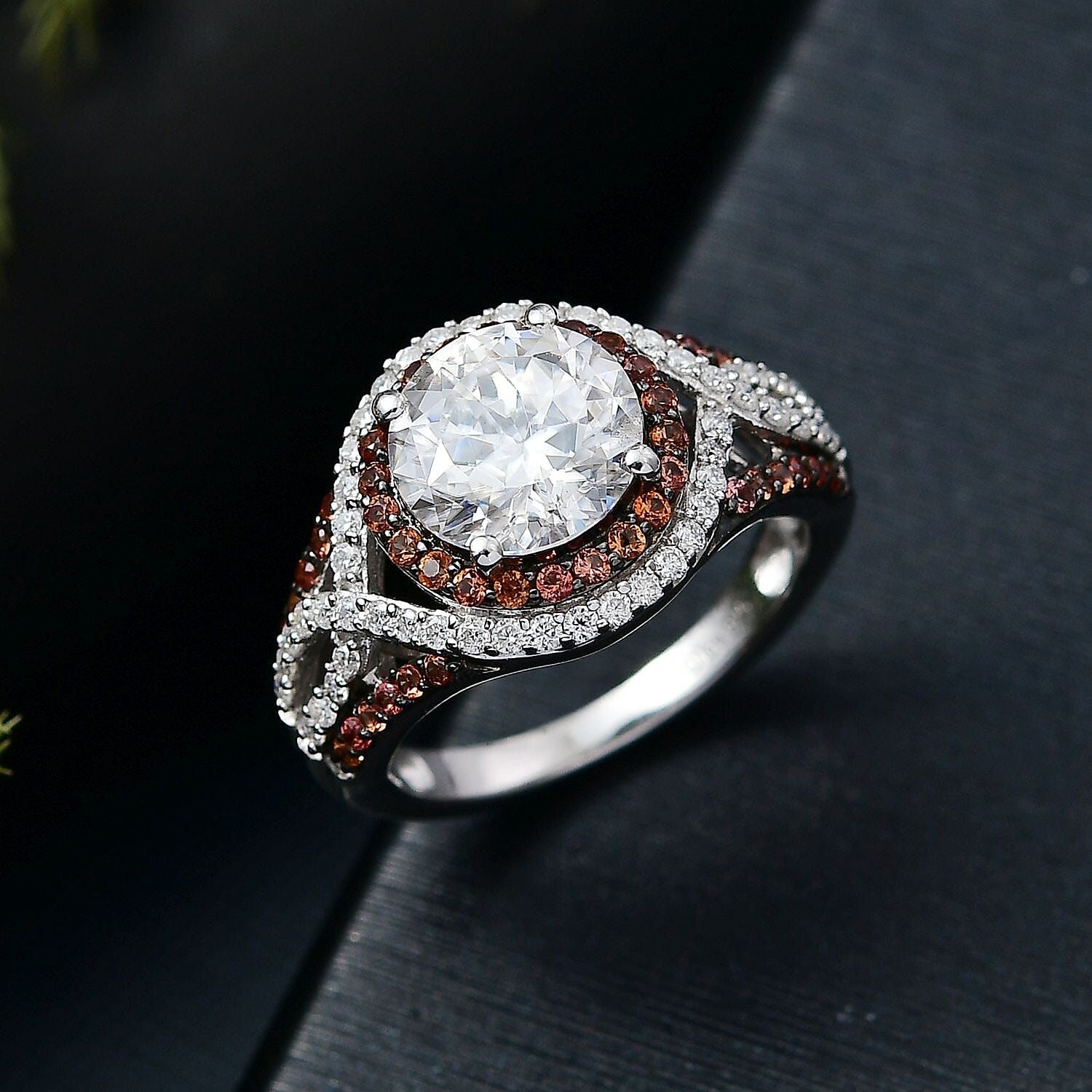 D'Joy 100 Facets Moissanite and Red Sapphire 3.75 ctw Celestial Halo Ring in Rhodium Over Sterling Silver (Size 10.0)