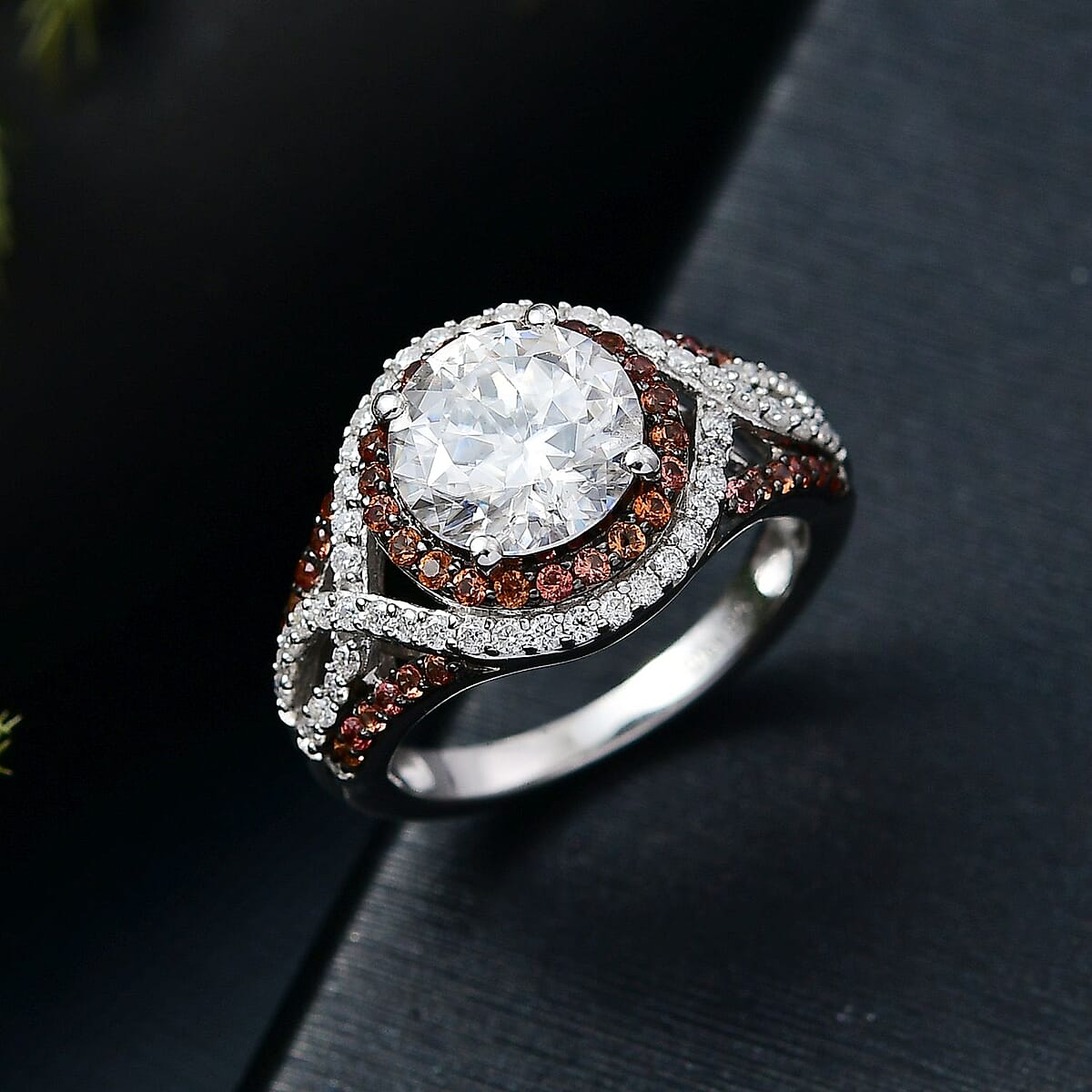 D'Joy 100 Facets Moissanite and Red Sapphire 3.75 ctw Celestial Halo Ring in Rhodium Over Sterling Silver (Size 10.0) image number 1