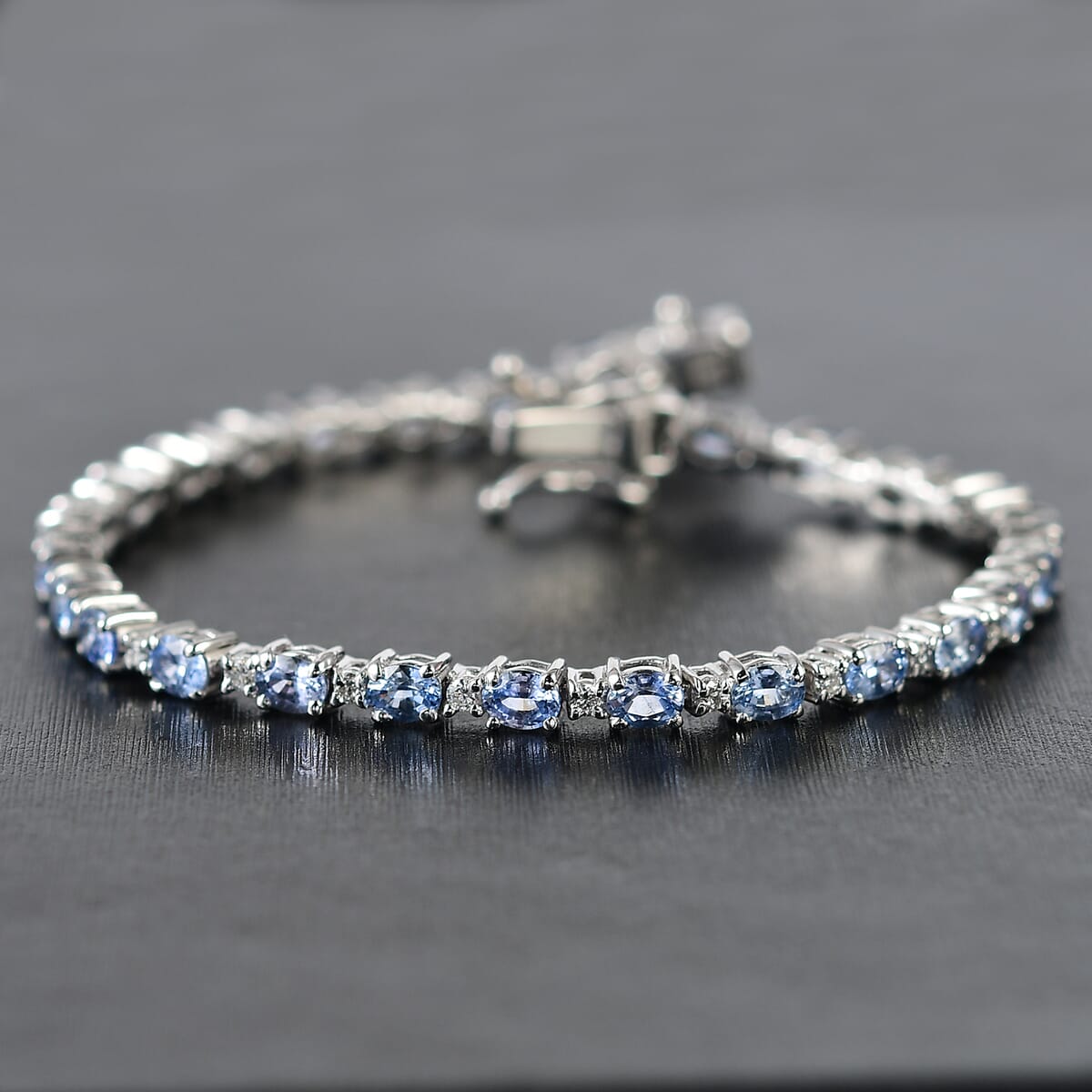 Ceylon Blue Sapphire and Luxuriant Lab Grown Diamond 7.00 ctw Water Bubbles Bracelet in Rhodium Over Sterling Silver (6.50 In) image number 1