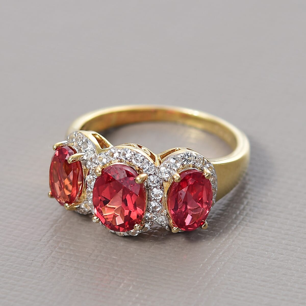 D'Joy Lab Created Padparadscha and White Sapphire 4.50 ctw Trilogy Halo Ring in 18K Vermeil Yellow Gold Over Sterling Silver (Size 10.0) image number 1