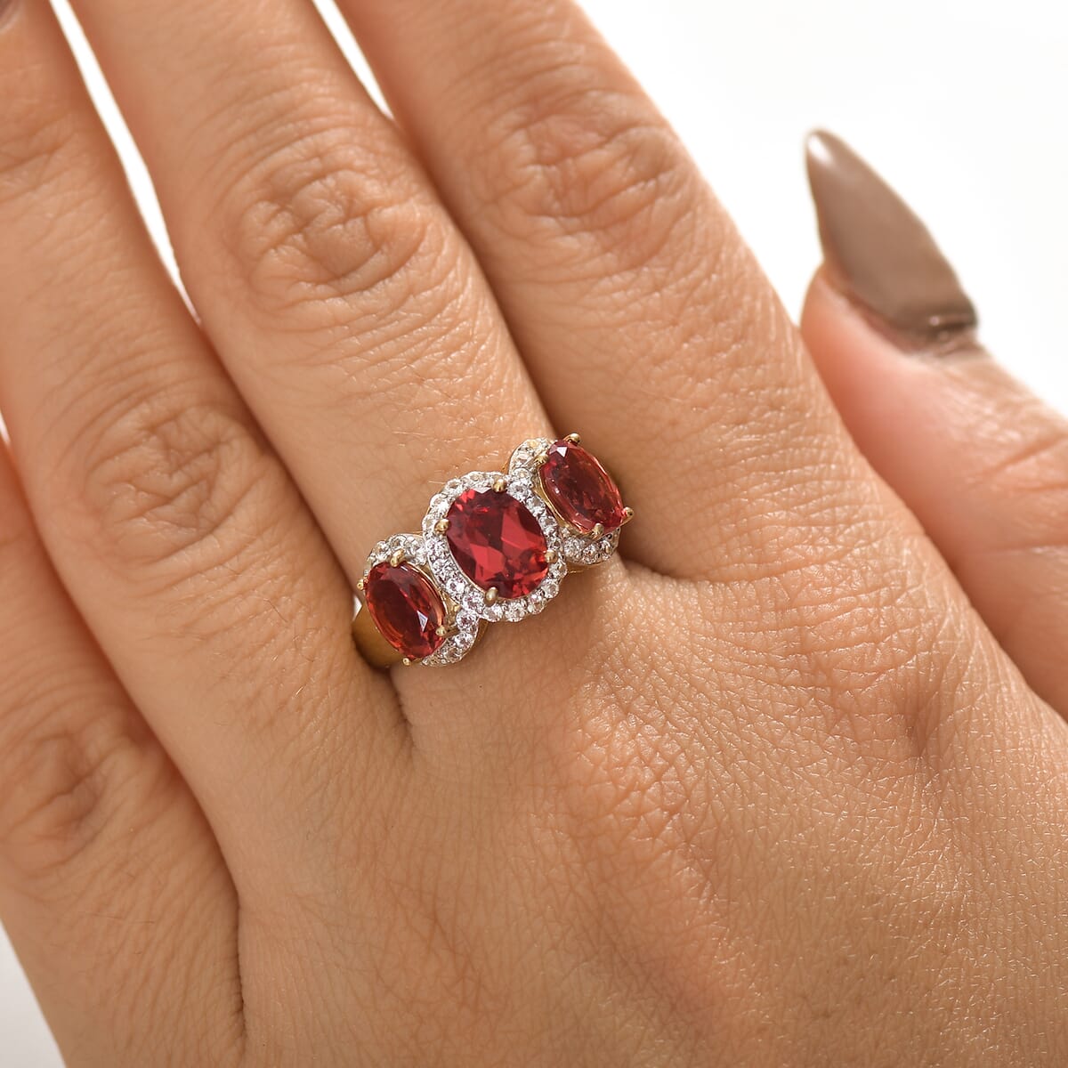 D'Joy Lab Created Padparadscha and White Sapphire 4.50 ctw Trilogy Halo Ring in 18K Vermeil Yellow Gold Over Sterling Silver (Size 5.0) image number 2