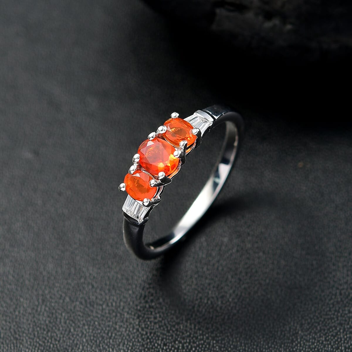 D'Joy Crimson Fire Opal and White Zircon 0.70 ctw Blazing Trinity Ring in Rhodium Over Sterling Silver (Size 6.0) image number 1