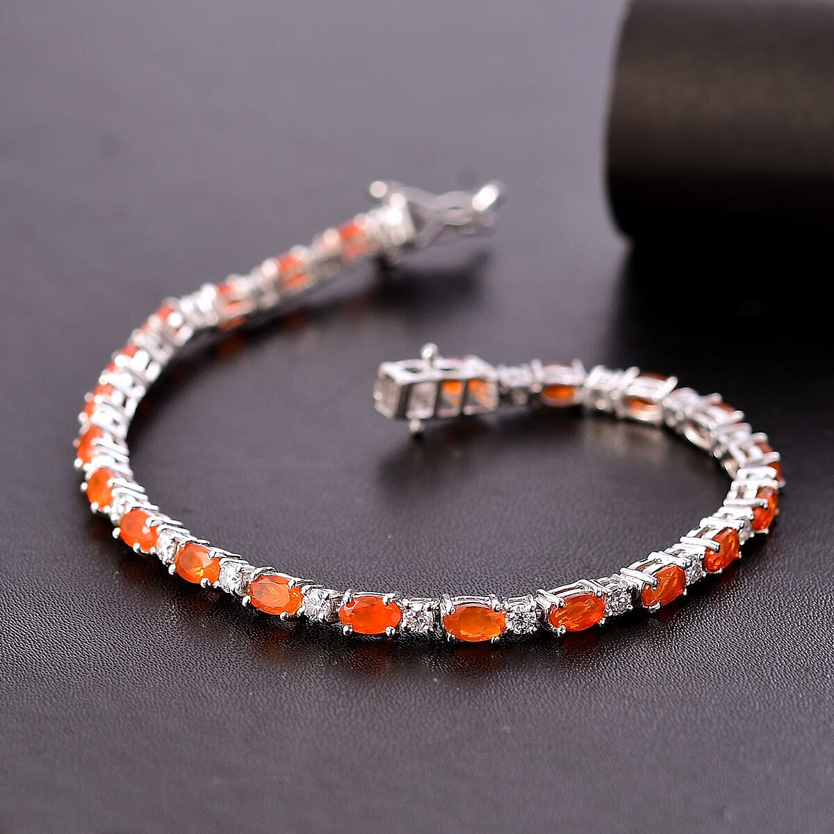 D'Joy Crimson Fire Opal and Moissanite 5.00 ctw Fiery Tennis Bracelet in Rhodium Over Sterling Silver (7.25 In) image number 1