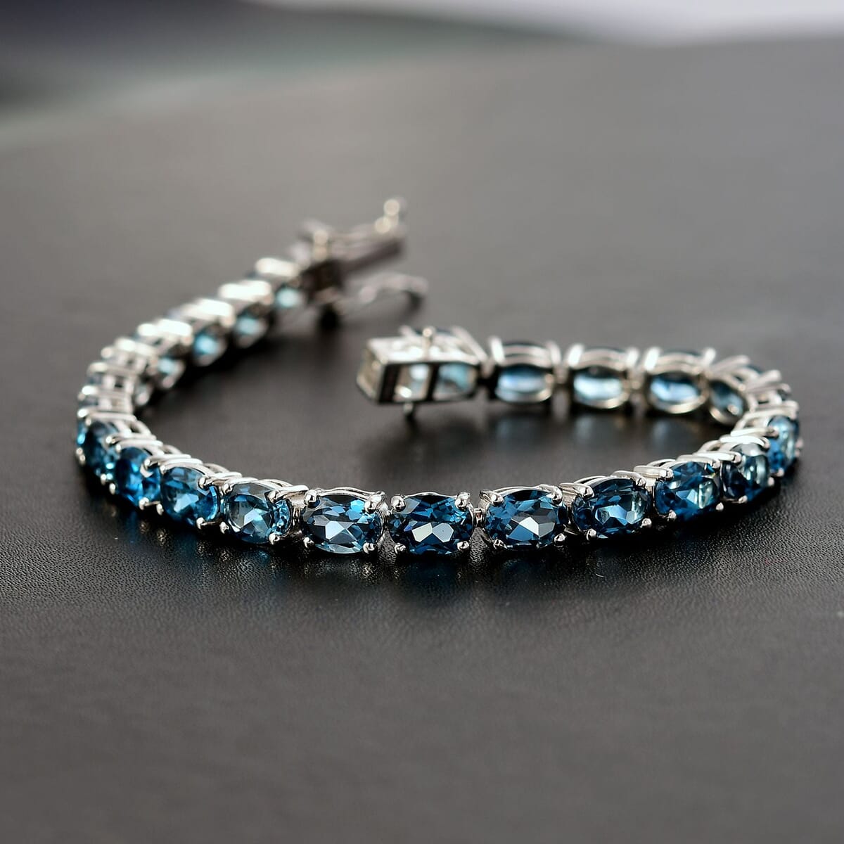 D'Joy Premium London Blue Topaz 27.60 ctw Ocean Symphony Bracelet in Rhodium Over Sterling Silver (7.25 In) image number 1