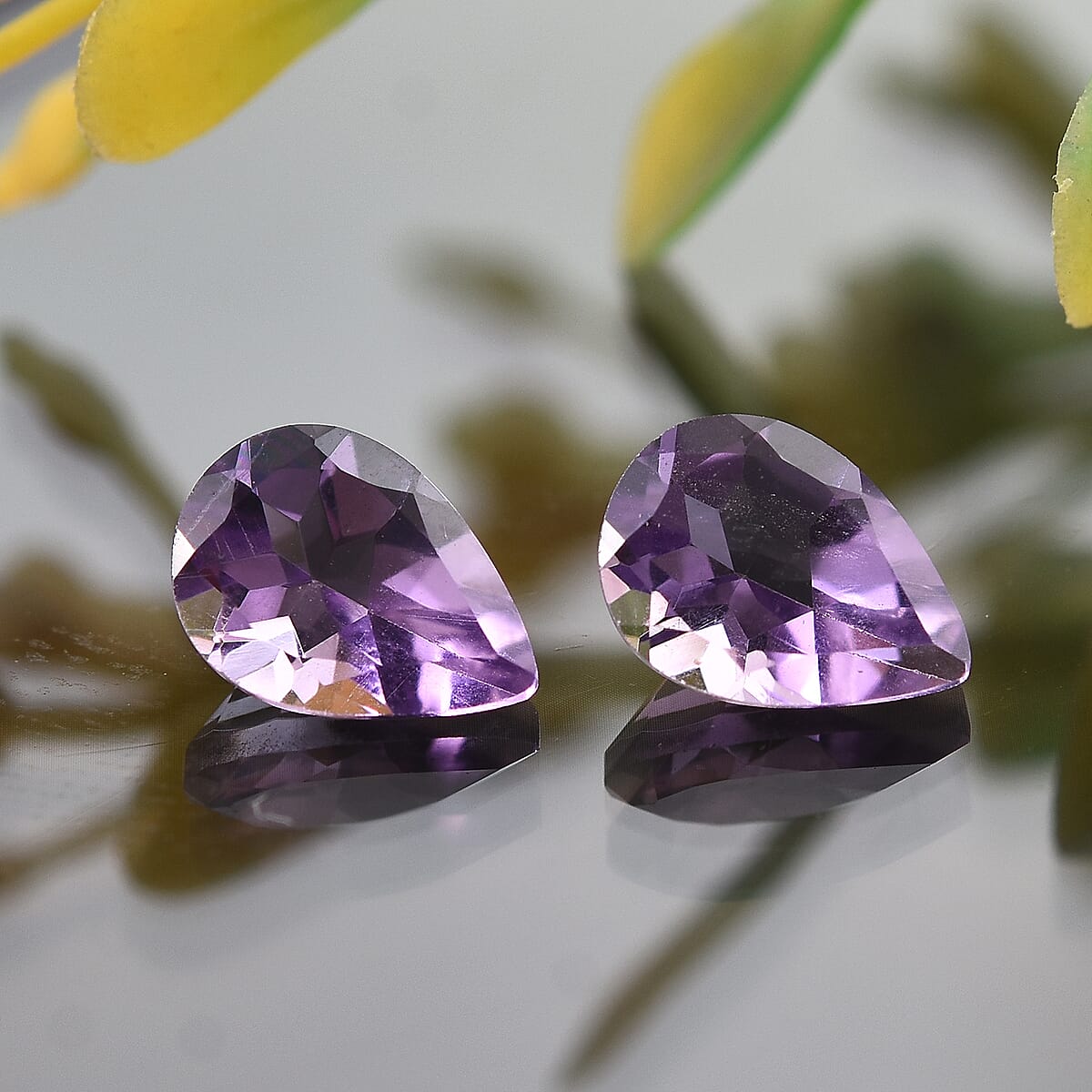 Bolivian Amethyst Set of 2 (Pear 7x5 mm) 1.19 ctw Loose Gemstone image number 1