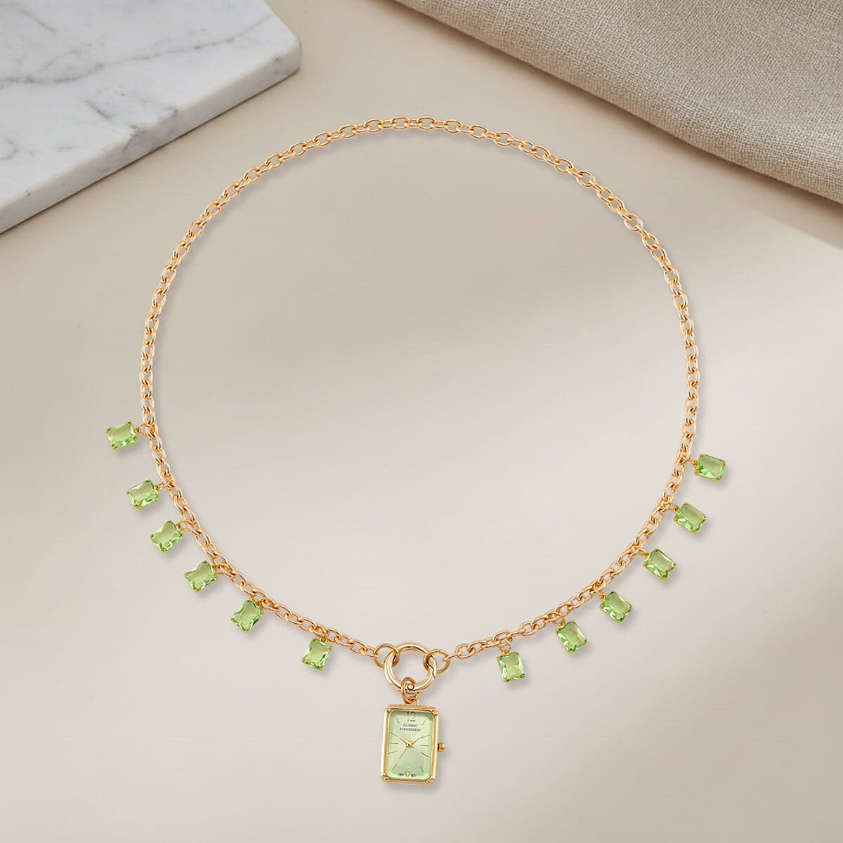 Classic Succession Simulated Green Diamond Miyota Japanese Movement watch in Goldtone with Stainless Steel Necklace (24 Inches) 18.00 ctw image number 1