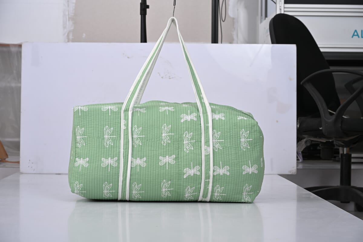 Green Quilted Fabric Bag with Zipper Closure image number 0