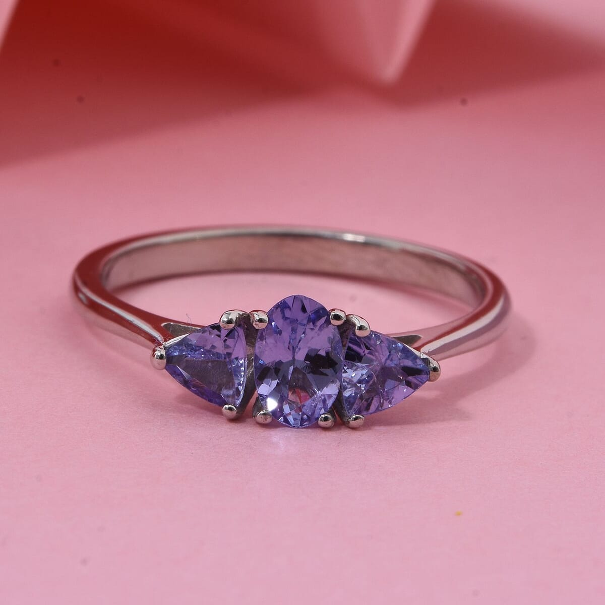 Tanzanite 0.85 ctw Trinity Ring in Rhodium Over Sterling Silver (Size 8.0) image number 1