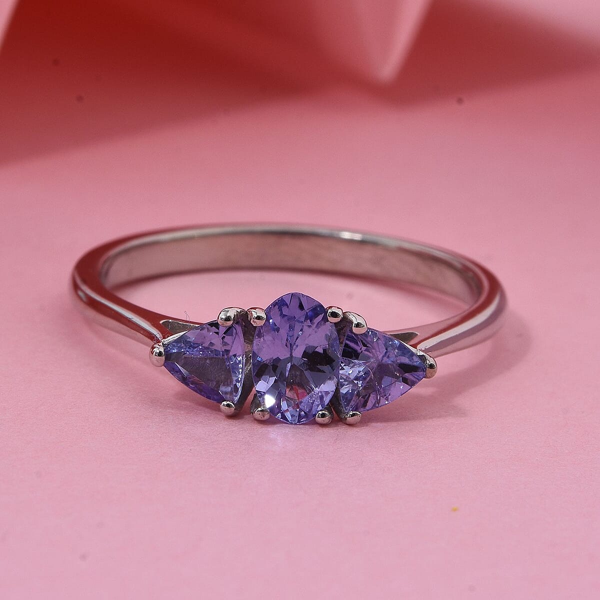 Tanzanite 0.85 ctw Trinity Ring in Rhodium Over Sterling Silver (Size 9.0) image number 1