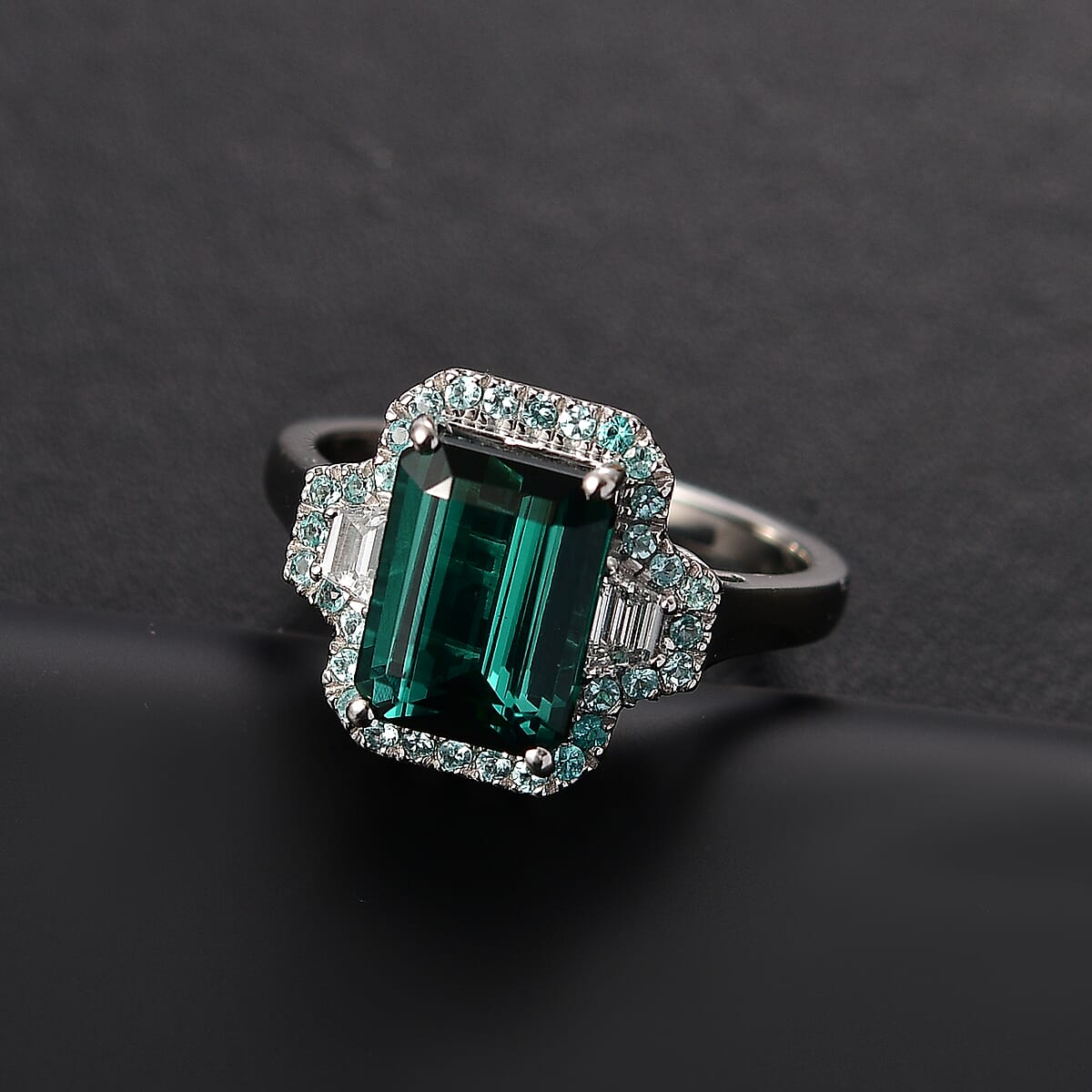 Rhapsody 950 Platinum AAAA Pirineu Lagoon Tourmaline, Paraiba Tourmaline and Diamond (E-F, VS2) (0.30 cts) Halo Ring (Size 7.5) (8.60 g) 5.25 ctw image number 1