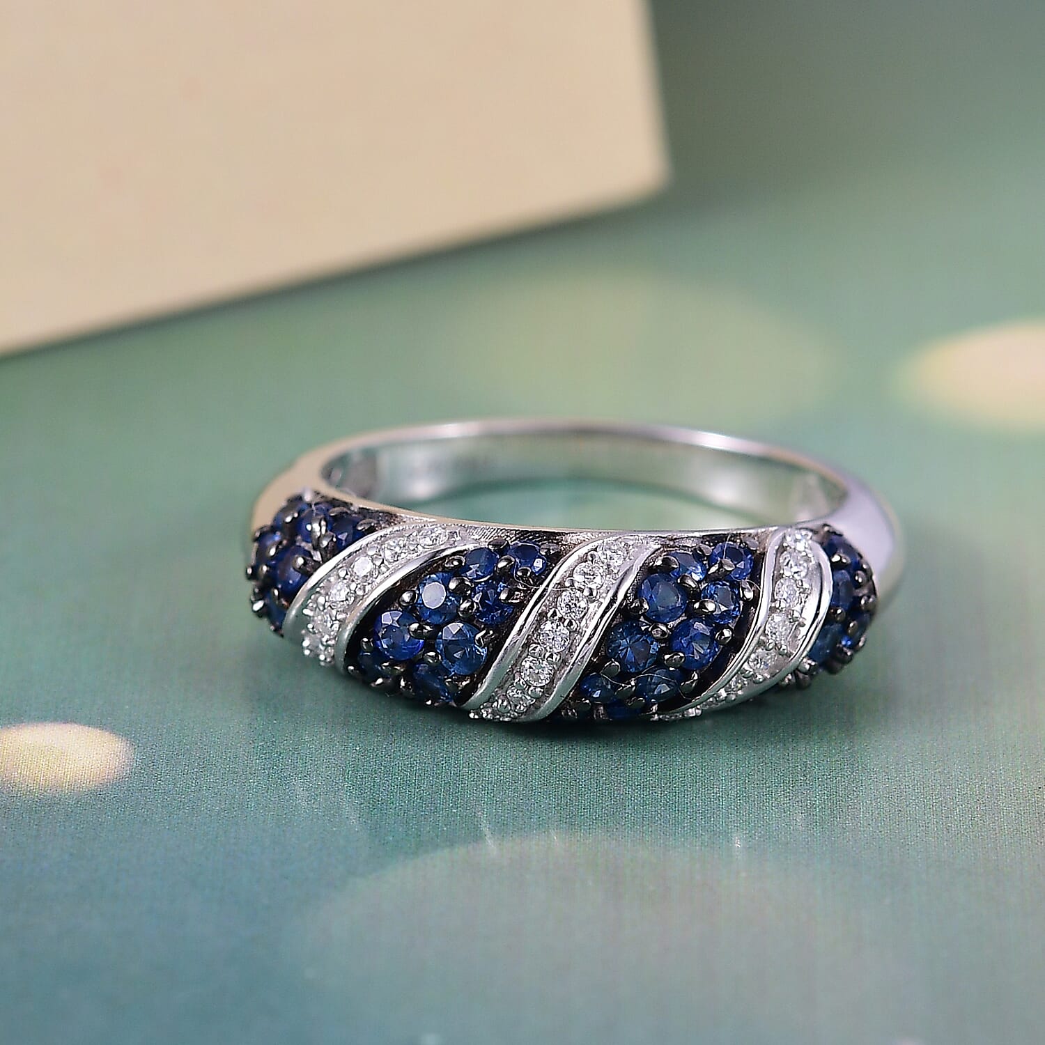 D'Joy Ceylon Blue Sapphire and Moissanite 1.00 ctw Wave Ring in Rhodium Over Sterling Silver (Size 7.0)
