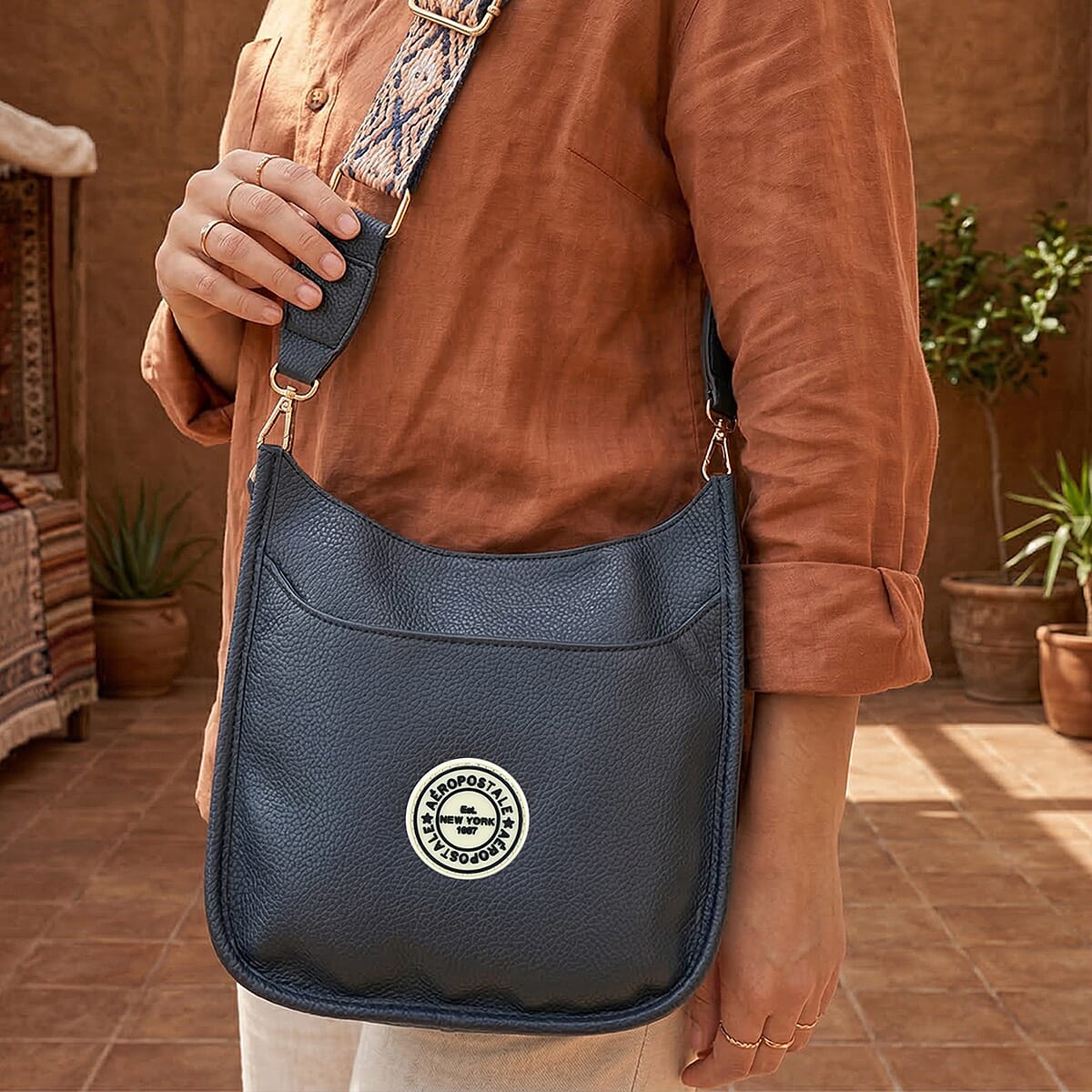 Aeropostale Navy Faux Leather Crossbody Bag with Beige Adjustable Shoulder Strap image number 3