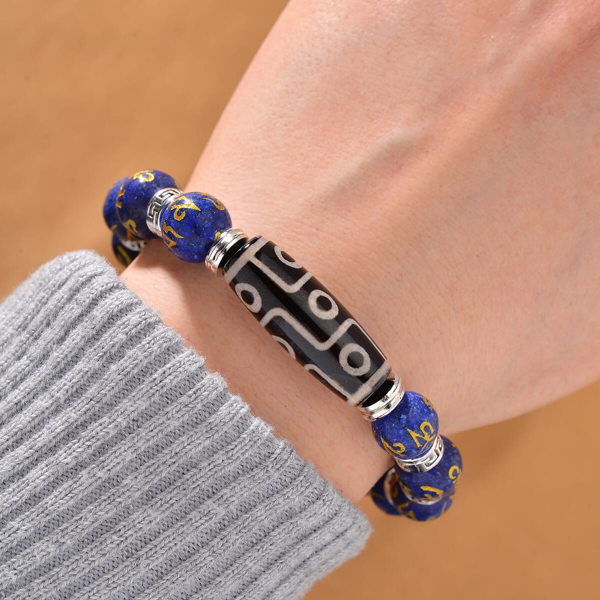Nine Eyed Agate Dzi Beads and Lapis Lazuli 135 ctw Feng Shui Beaded Stretch Bracelet in Silvertone image number 1