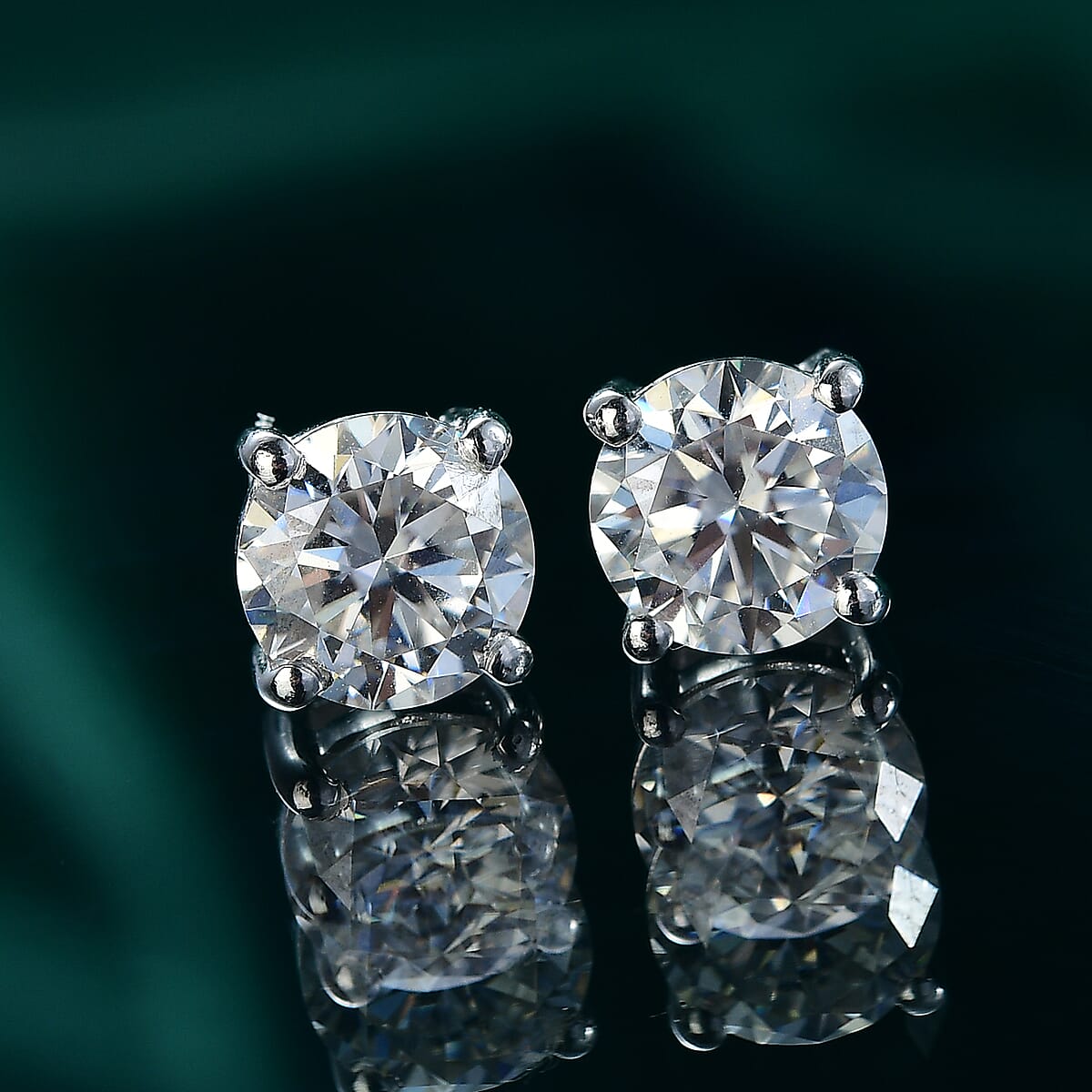 D'Joy Moissanite 2.40 ctw Solitaire Stud Earrings in Platinum Over Sterling Silver image number 1