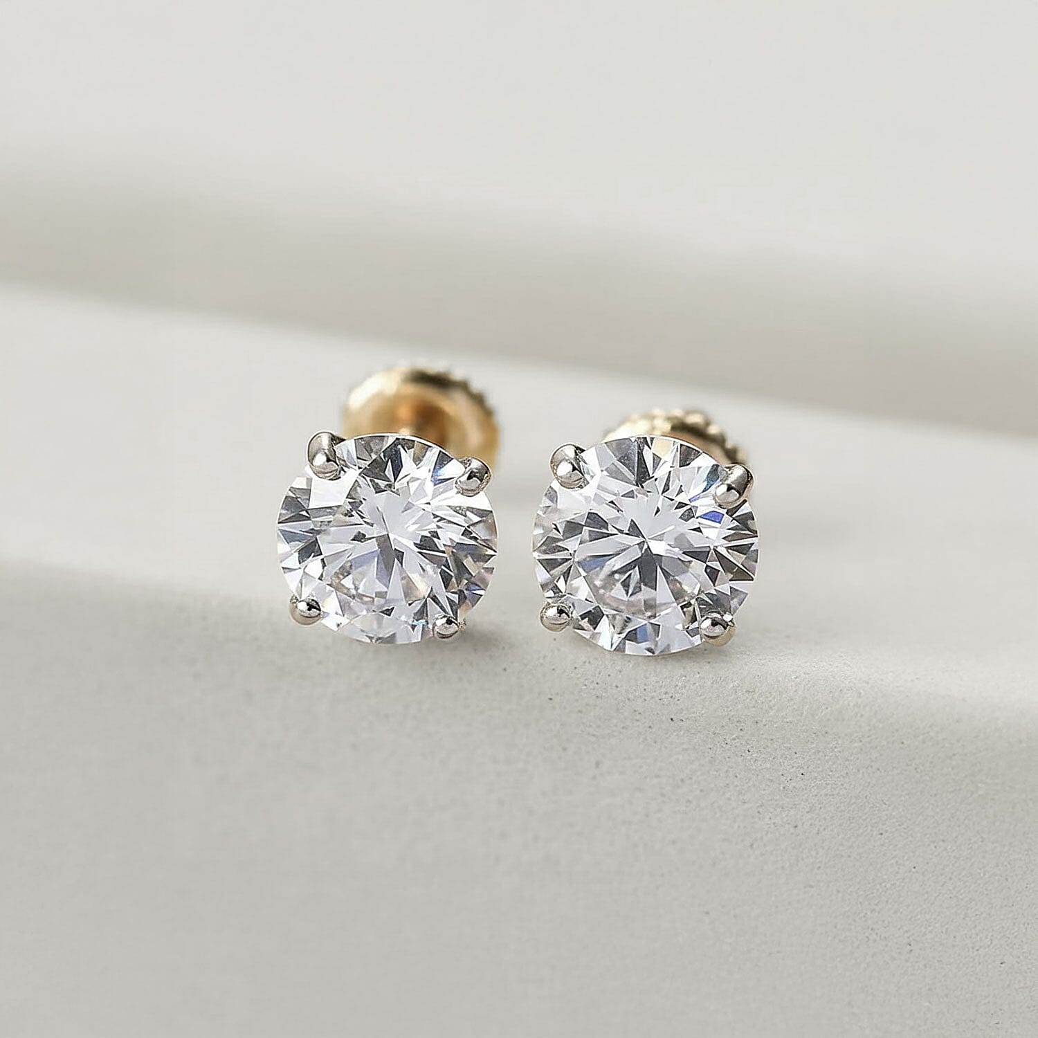 IGI Certified Luxuriant Lab Grown Diamond E-F VS 2.00 ctw Solitaire Stud Earrings in 14K Yellow Gold (Del. In 8-10 Days)