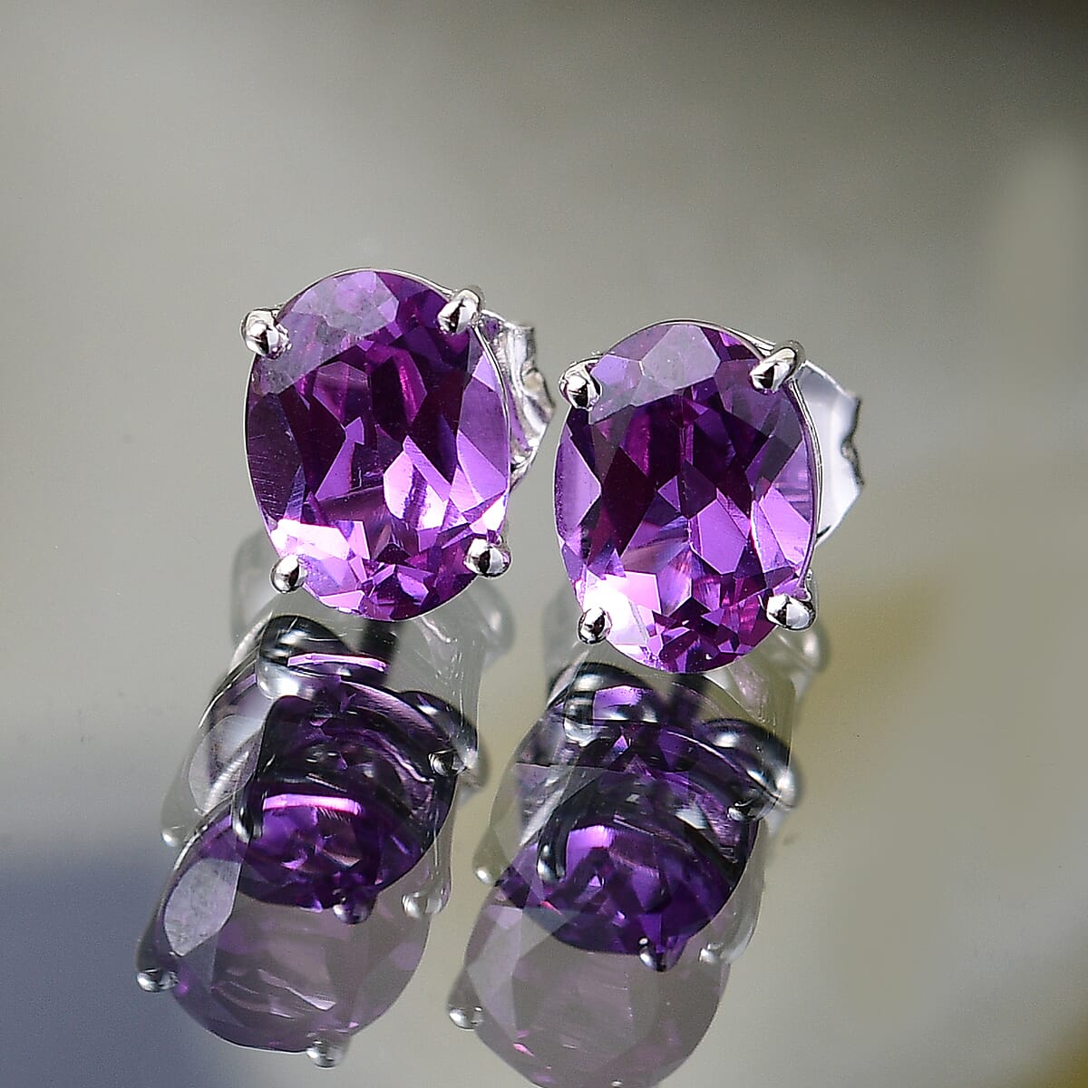 Certified & Appraised AAA Luxuriant Lab Grown Purple Sapphire 2.77 ctw Solitaire Stud Earrings in 10K White Gold image number 1