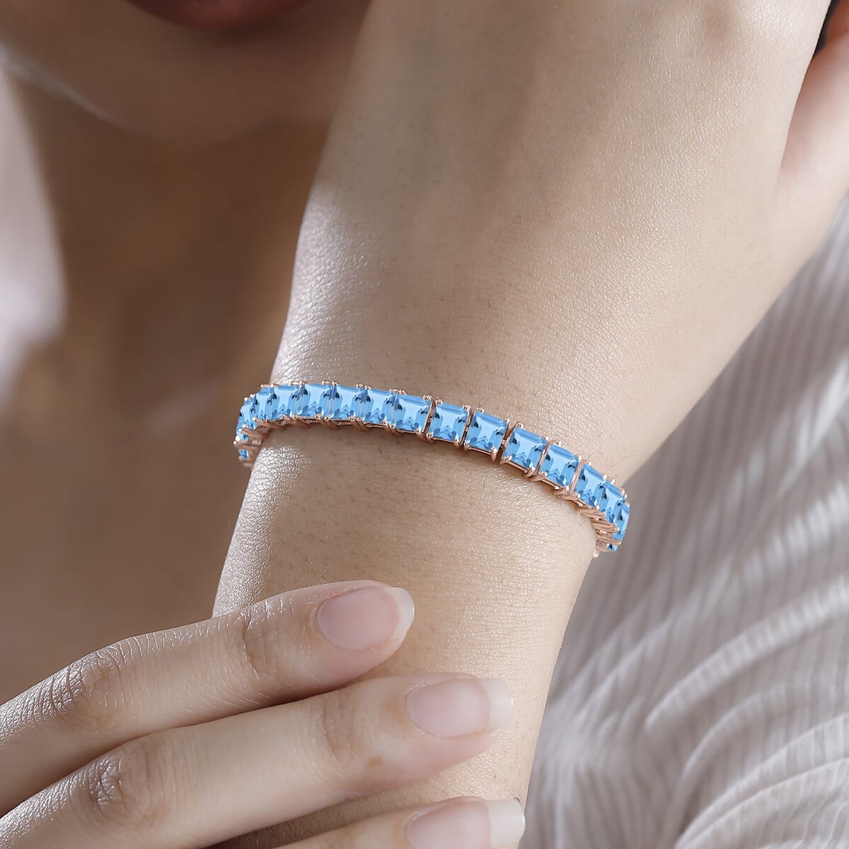 Sky Blue Topaz 22.10 ctw Tennis Bracelet in 18K Vermeil Rose Gold Over Sterling Silver (7.25 In) image number 1