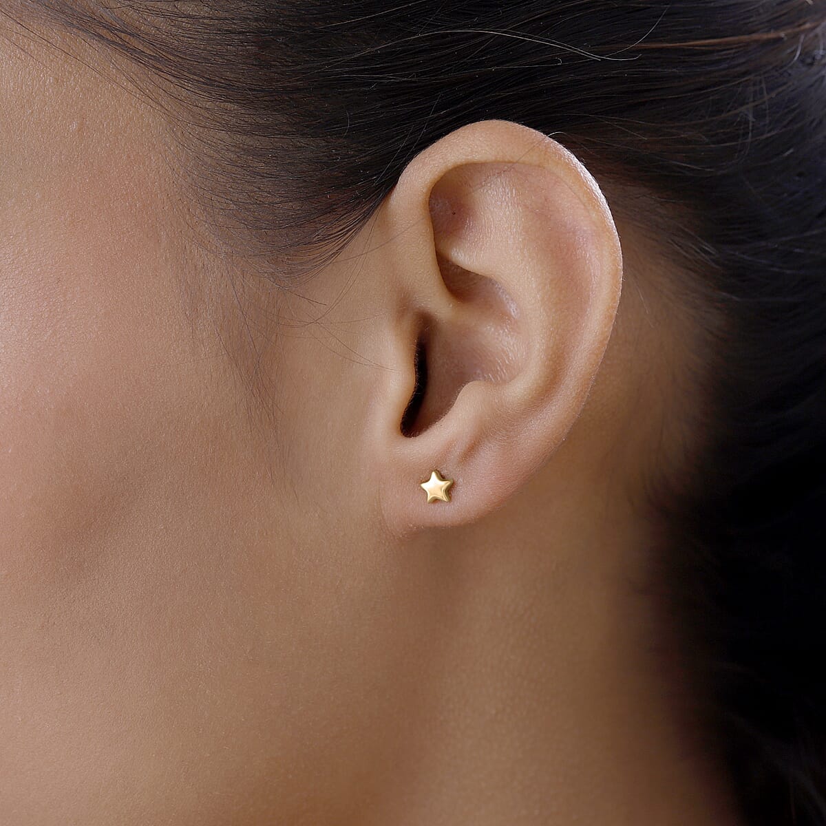 Star Stud Earrings in 10K Yellow Gold 0.71 Grams (Del. in 10-12 Days) image number 1
