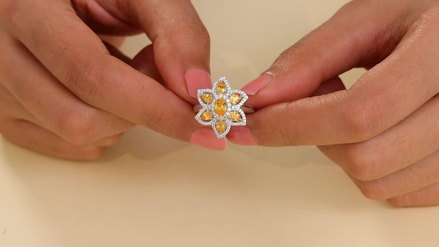 D'Joy Tanzanian Mandarin Garnet, White Zircon Frangipani Flower Ring in Rhodium Over Sterling Silver (Size 7.0) (Del. in 10-12 Days) 2.50 ctw