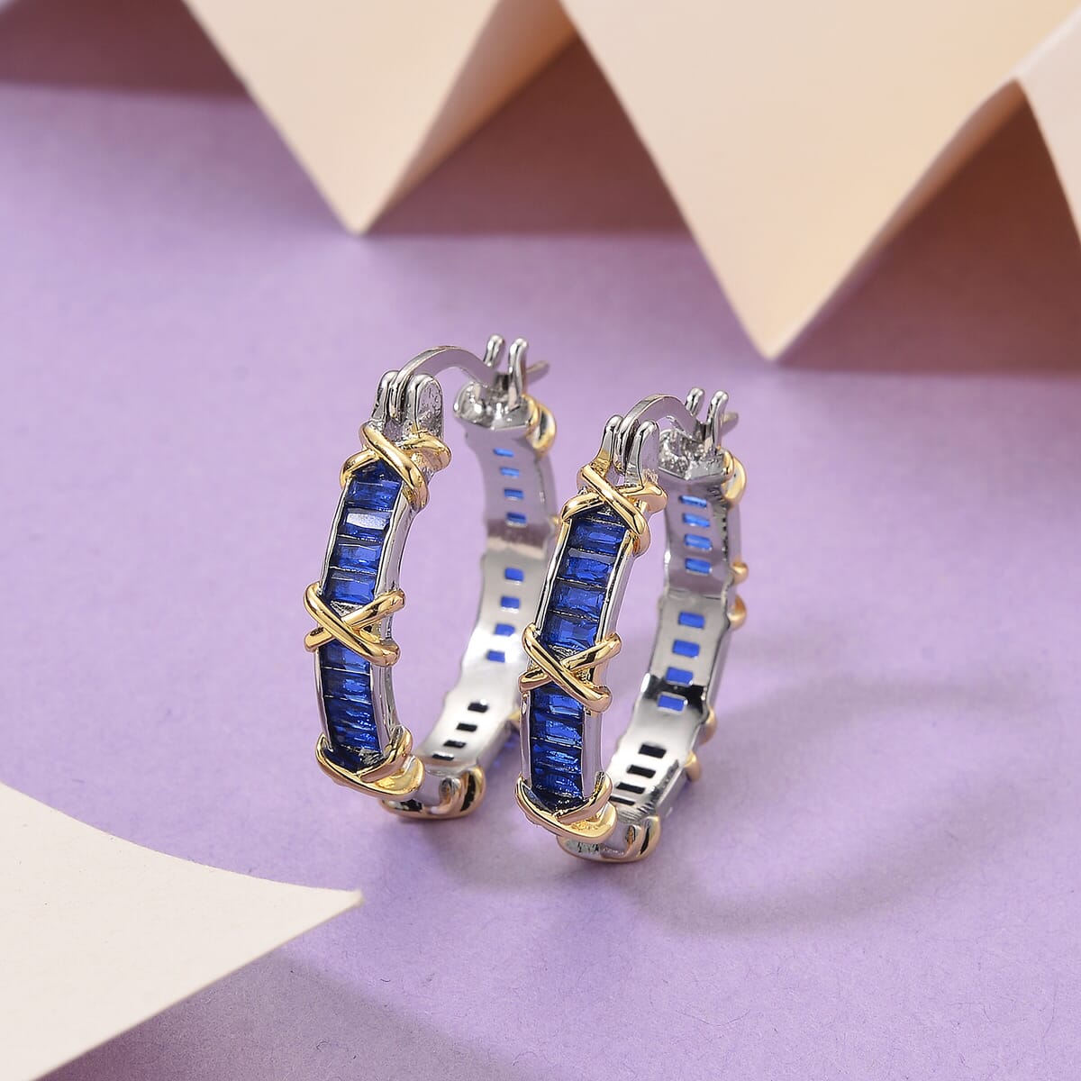 Karis Simulated Blue Diamond XOXO Hoop Earrings in 18K YG Plated and Platinum Bond image number 1