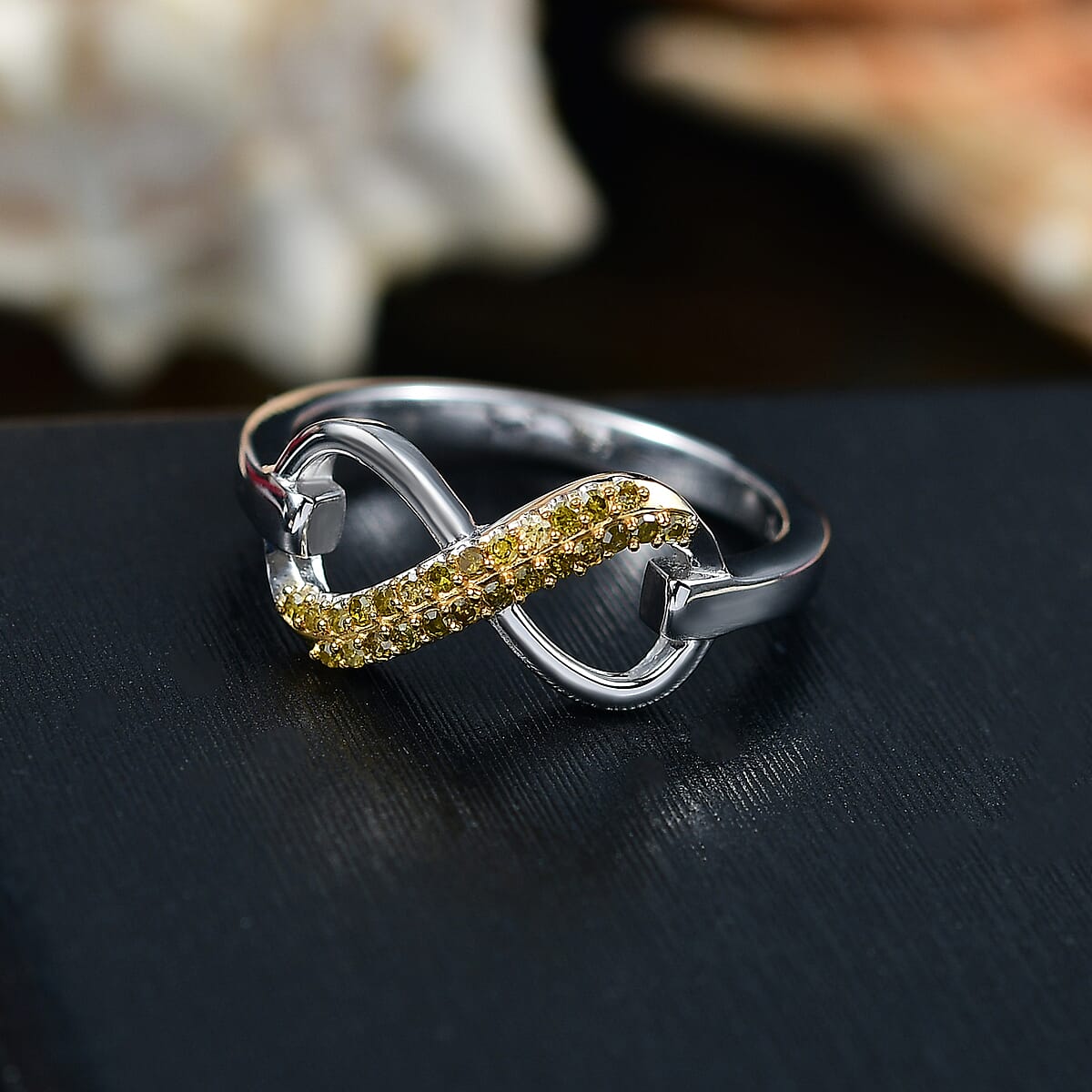 D'Joy Yellow Diamond 0.15 ctw Infinity Ring in Rhodium Over Sterling Silver (Size 7.0) image number 1