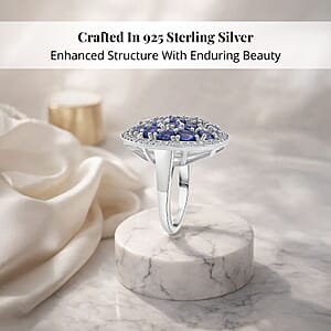 Premium Ceylon Blue Sapphire and Moissanite 4.50 ctw Royal Tides Ring in Rhodium Over Sterling Silver (Size 8.0)