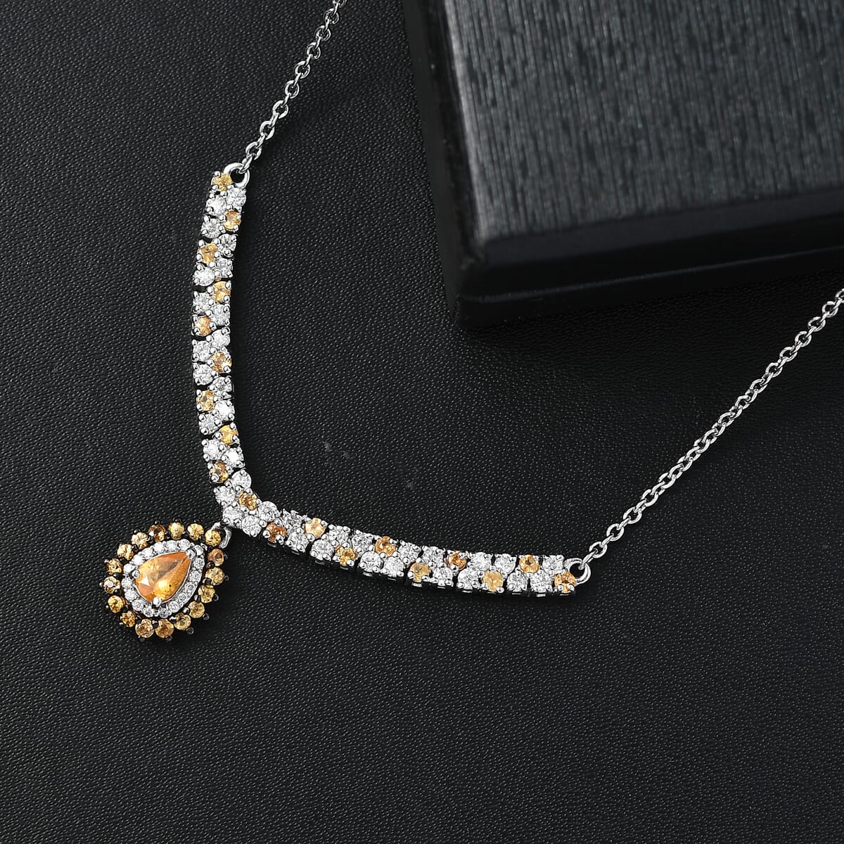 D'Joy Tanzanian Mandarin Garnet and Moissanite 2.35 ctw Kindled Curve Necklace 18 Inches in Rhodium Over Sterling Silver  image number 1