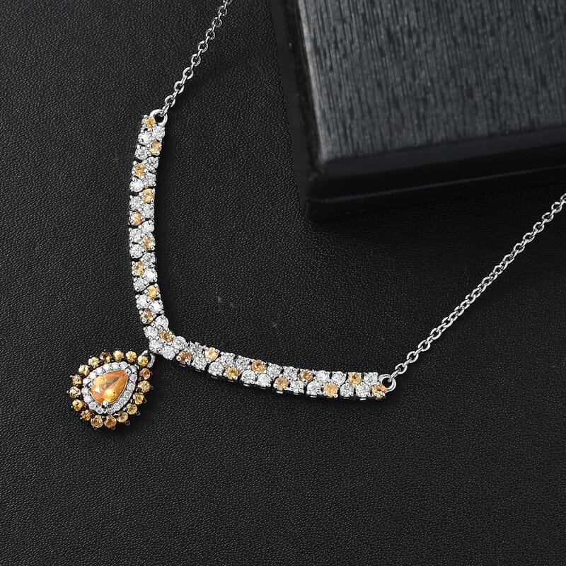 D'Joy Tanzanian Mandarin Garnet and Moissanite 2.35 ctw Kindled Curve Necklace 18 Inches in Rhodium Over Sterling Silver
