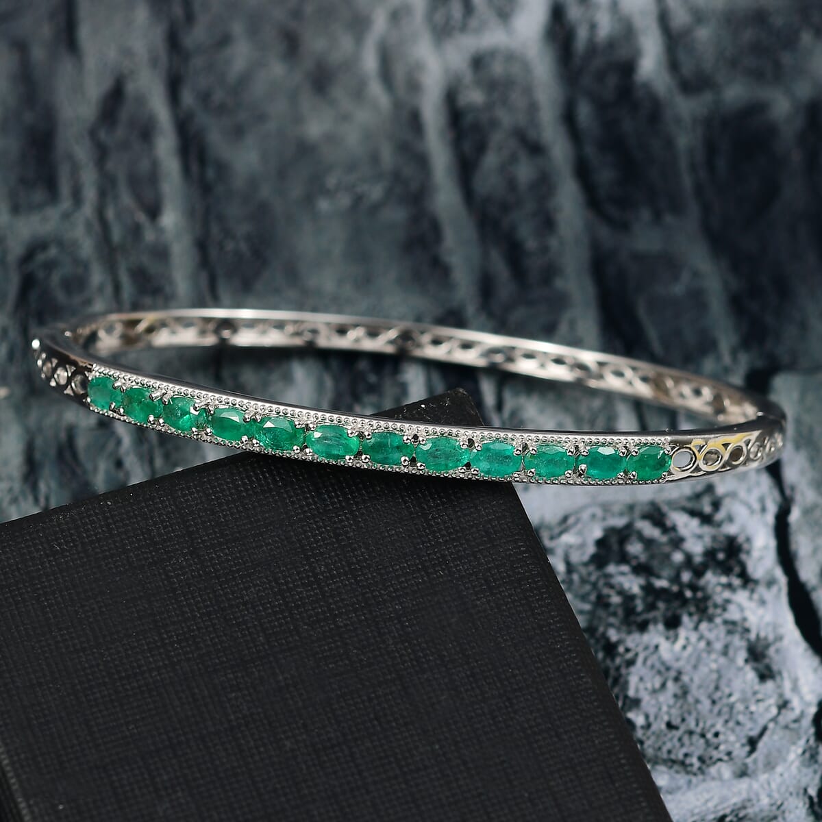 Premium Kagem Zambian Emerald 2.80 ctw Infinity Bangle Bracelet in Rhodium Over Sterling Silver (7.25 In) image number 1